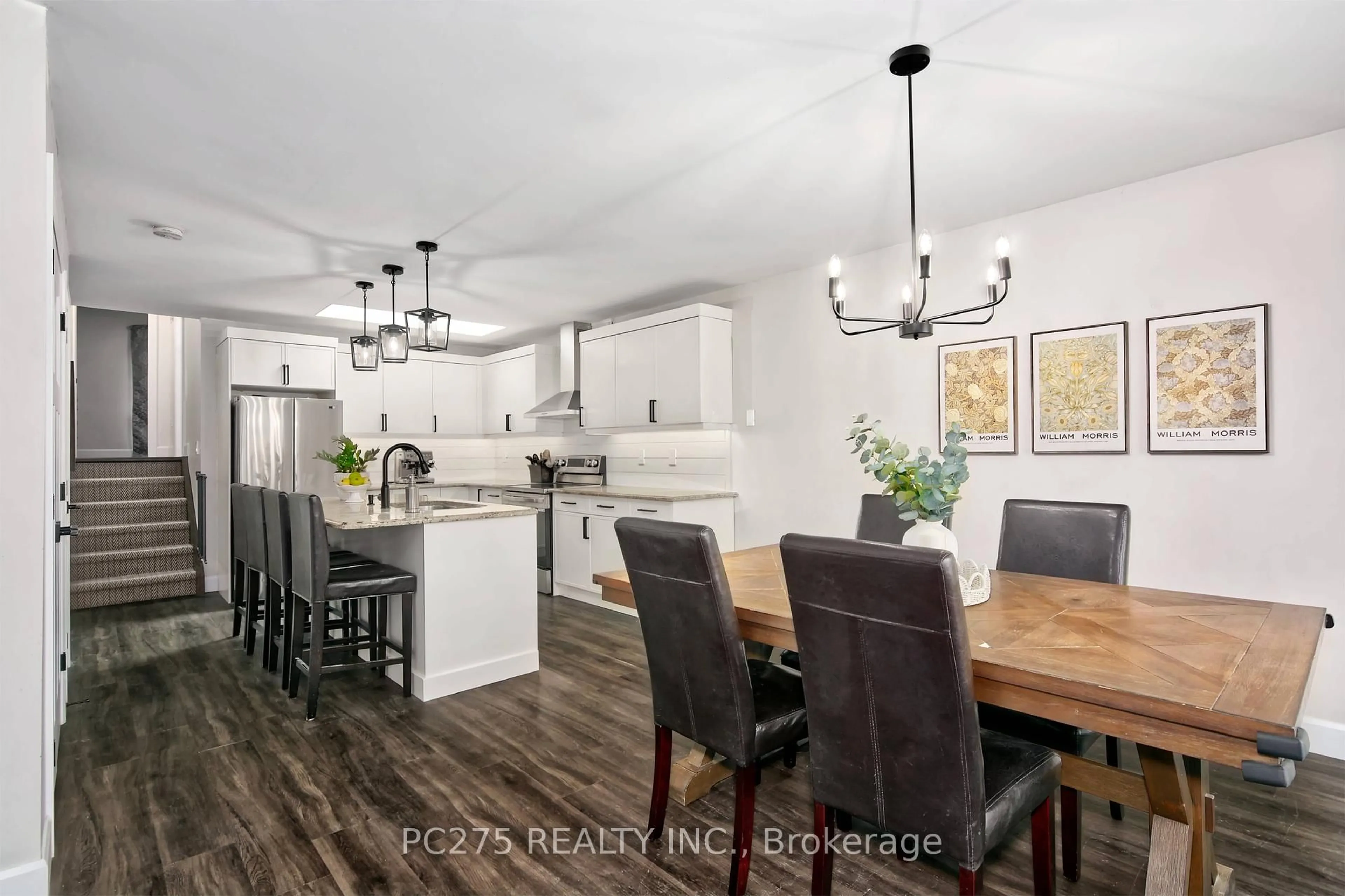 Open concept kitchen, wood/laminate floor for 46 Dell Dr, Strathroy-Caradoc Ontario N7G 4B6
