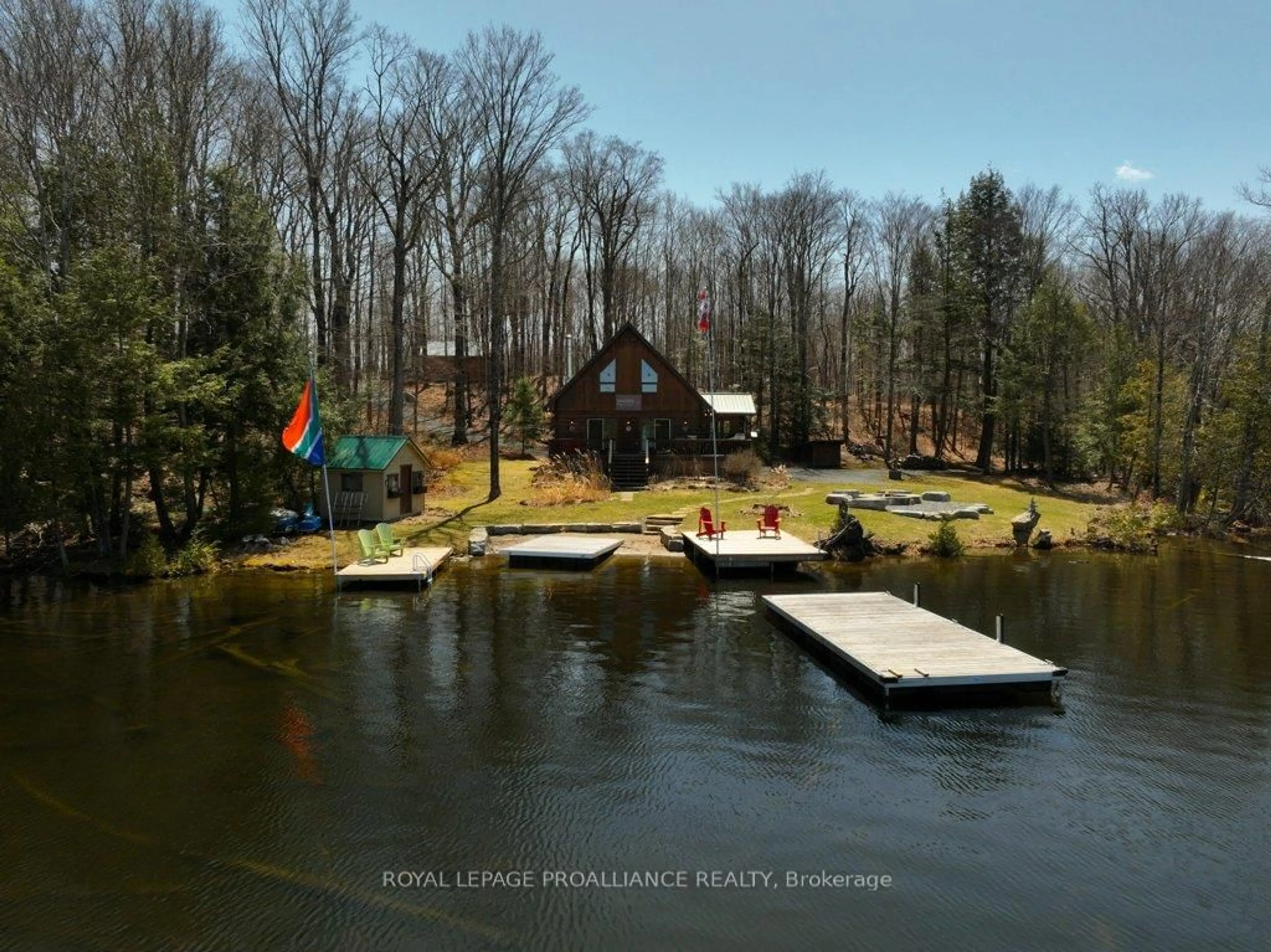 A pic from outside/outdoor area/front of a property/back of a property/a pic from drone, water/lake/river/ocean view for 2656 Smith Rd, Ardoch Ontario K0H 1C0