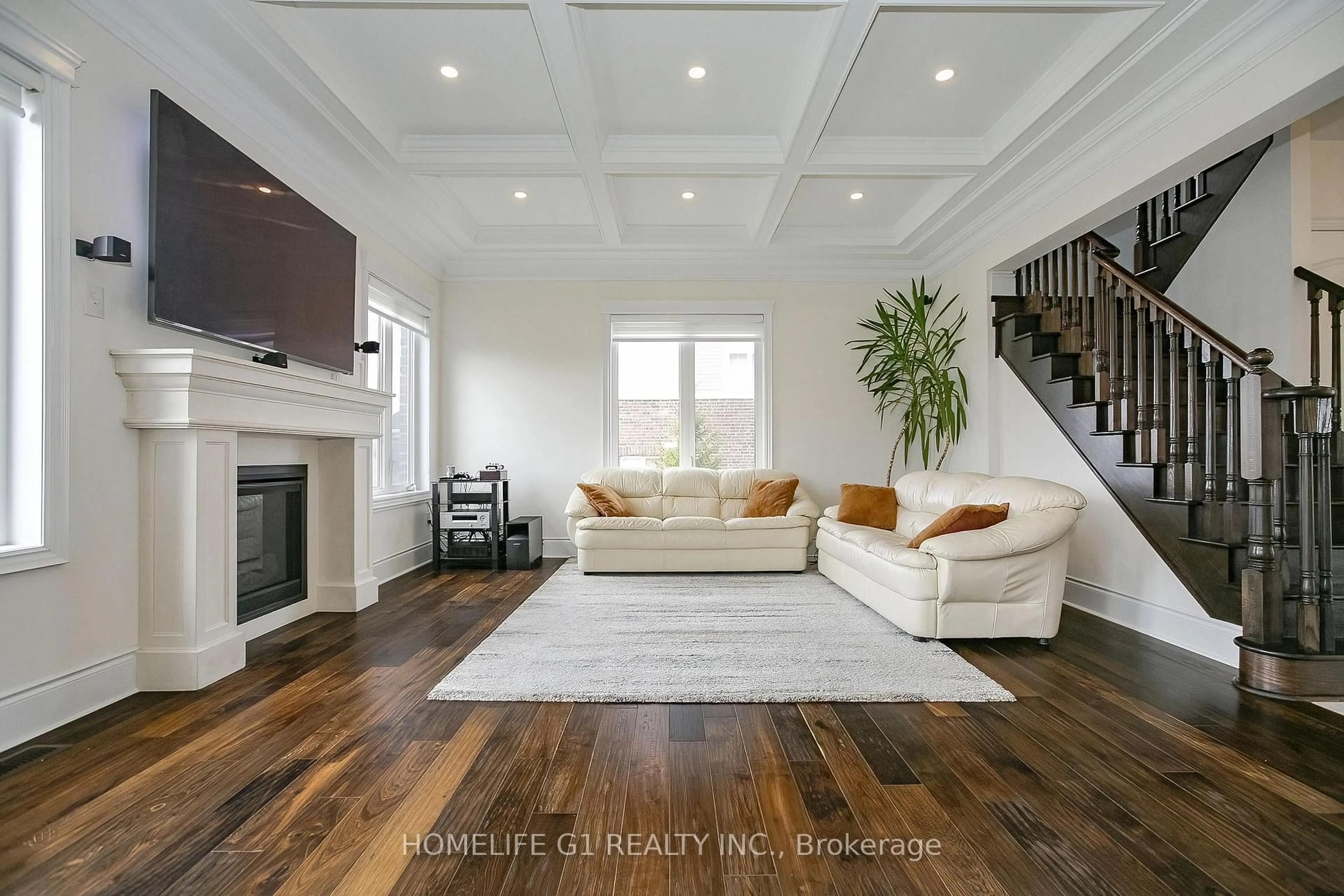 Living room with furniture, wood/laminate floor for 18 Meek Ave, Mono Ontario L9W 6W8