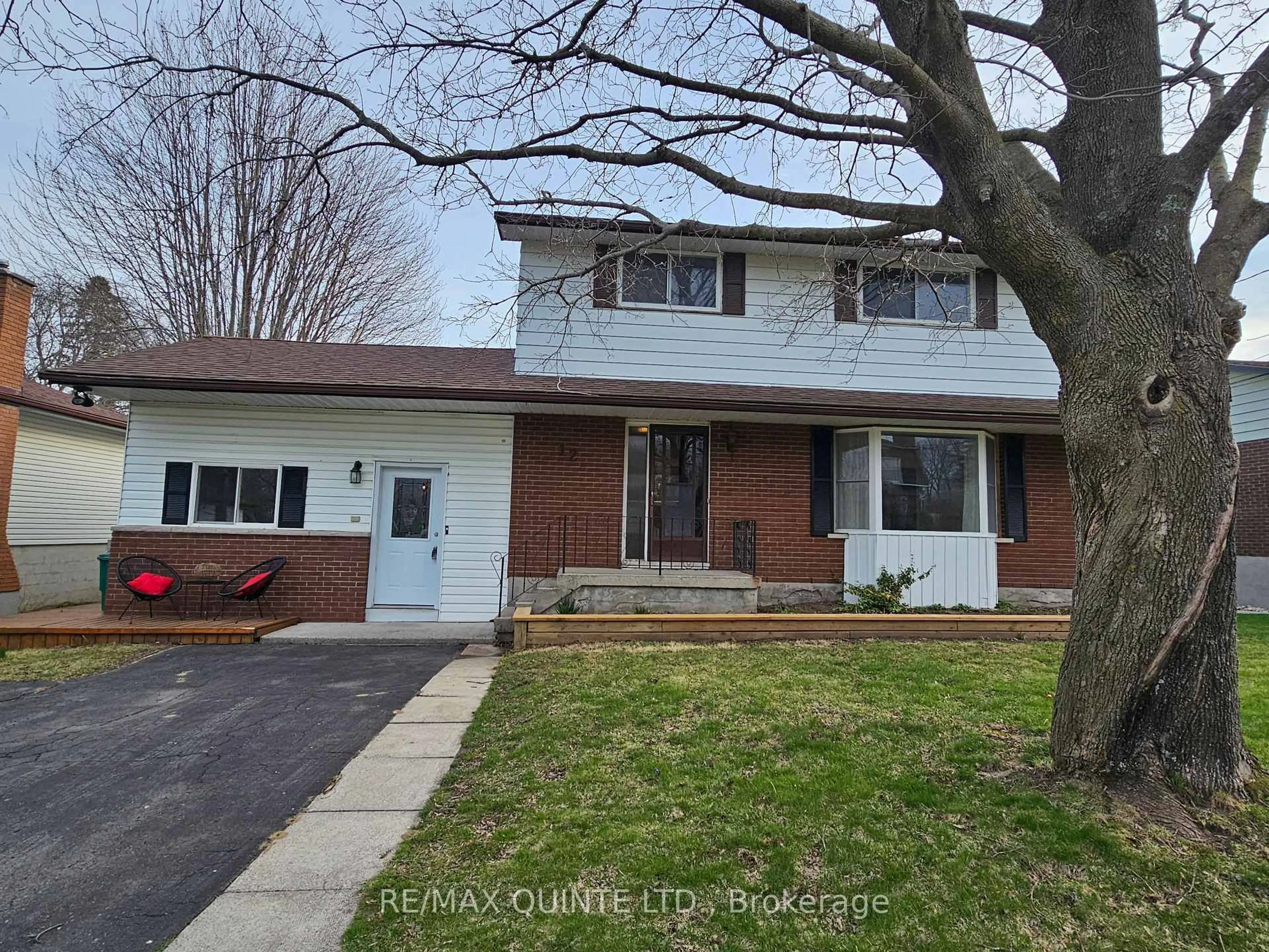 Home with vinyl exterior material, street for 12 Philip St, Prince Edward County Ontario K0K 2T0
