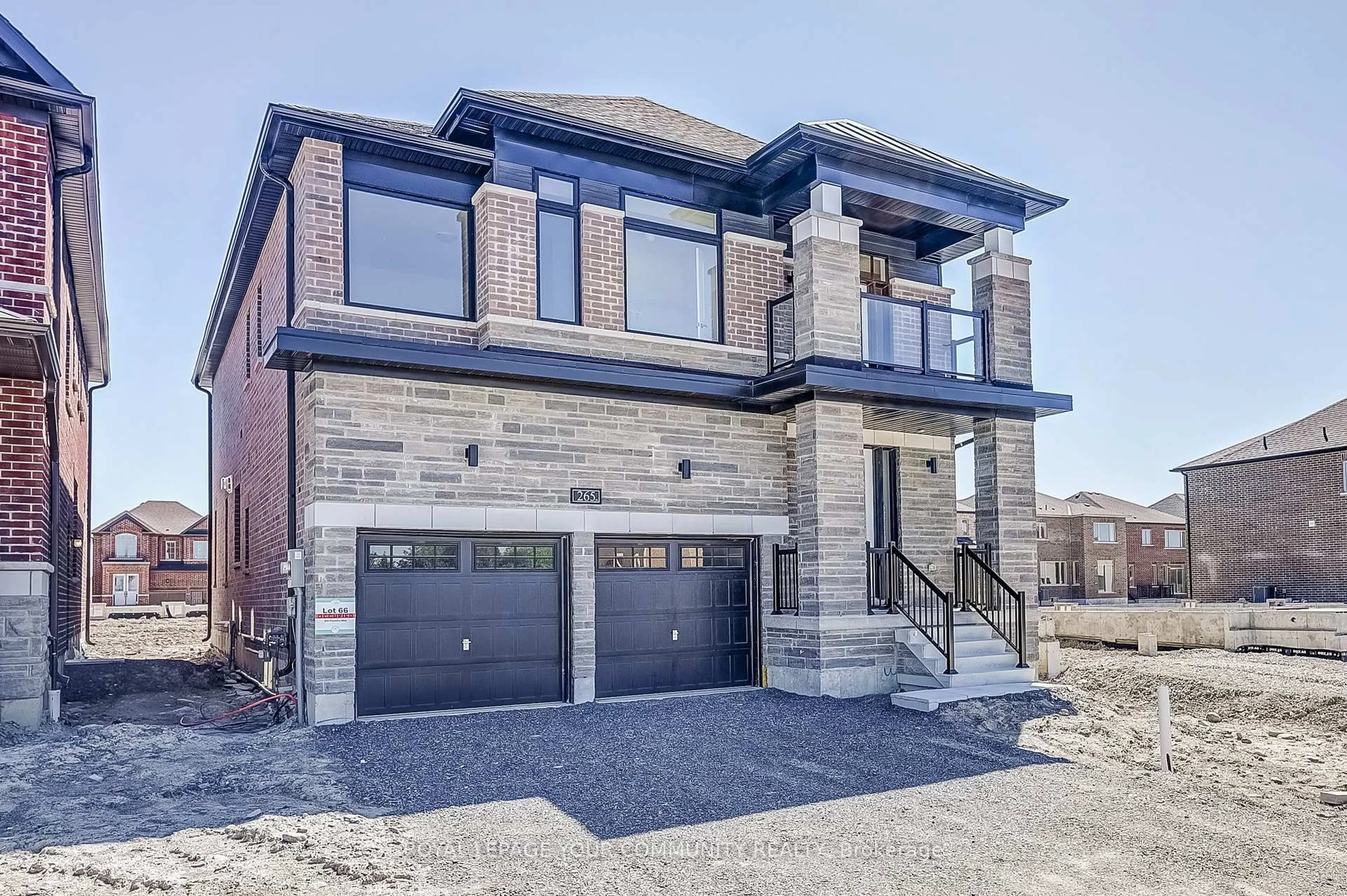Home with brick exterior material, street for 265 Flavelle Way, Selwyn Ontario K9K 0J2