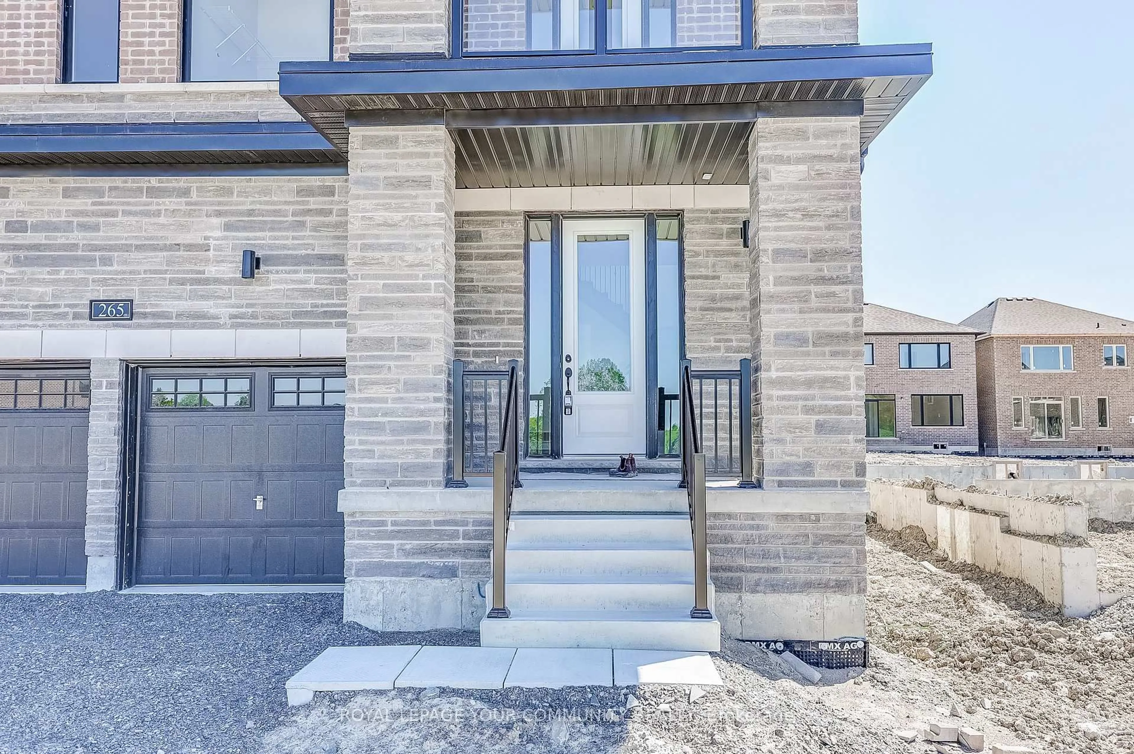 Home with brick exterior material, street for 265 Flavelle Way, Selwyn Ontario K9K 0J2