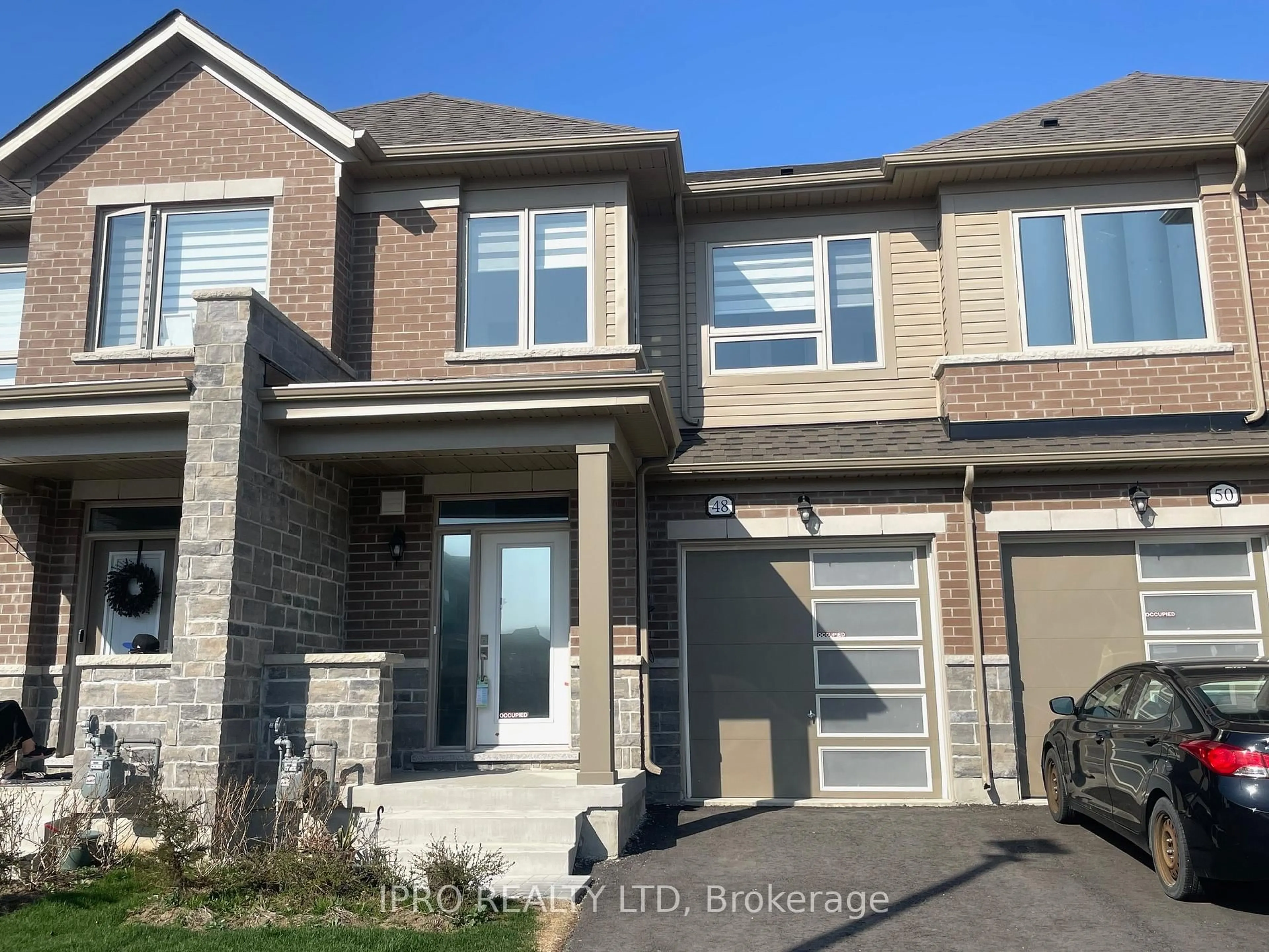 Home with brick exterior material, street for 48 Edminston Dr, Centre Wellington Ontario N1M 0J1