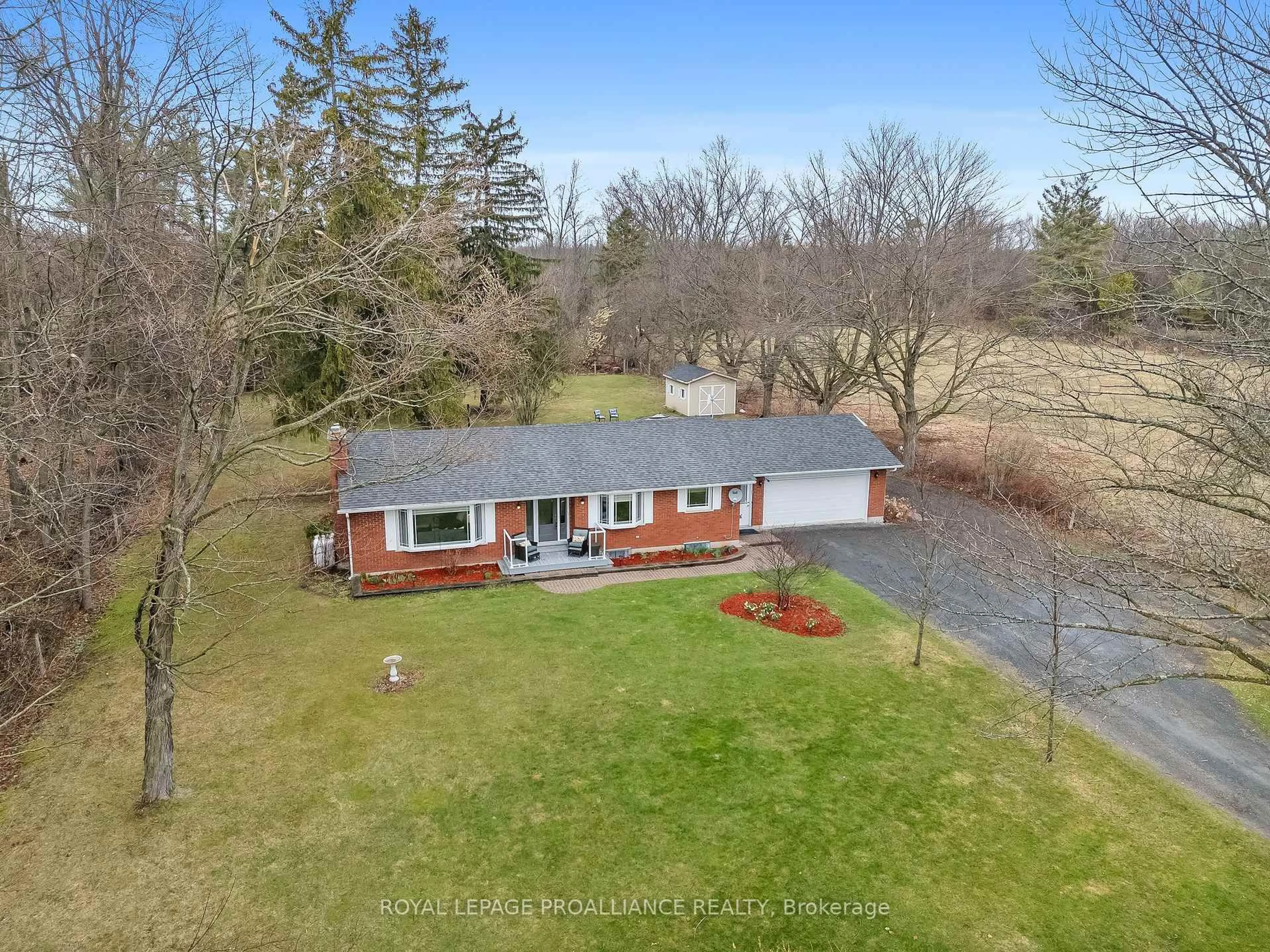 A pic from outside/outdoor area/front of a property/back of a property/a pic from drone, water/lake/river/ocean view for 3282 10th Line, Trent Hills Ontario K0L 1L0