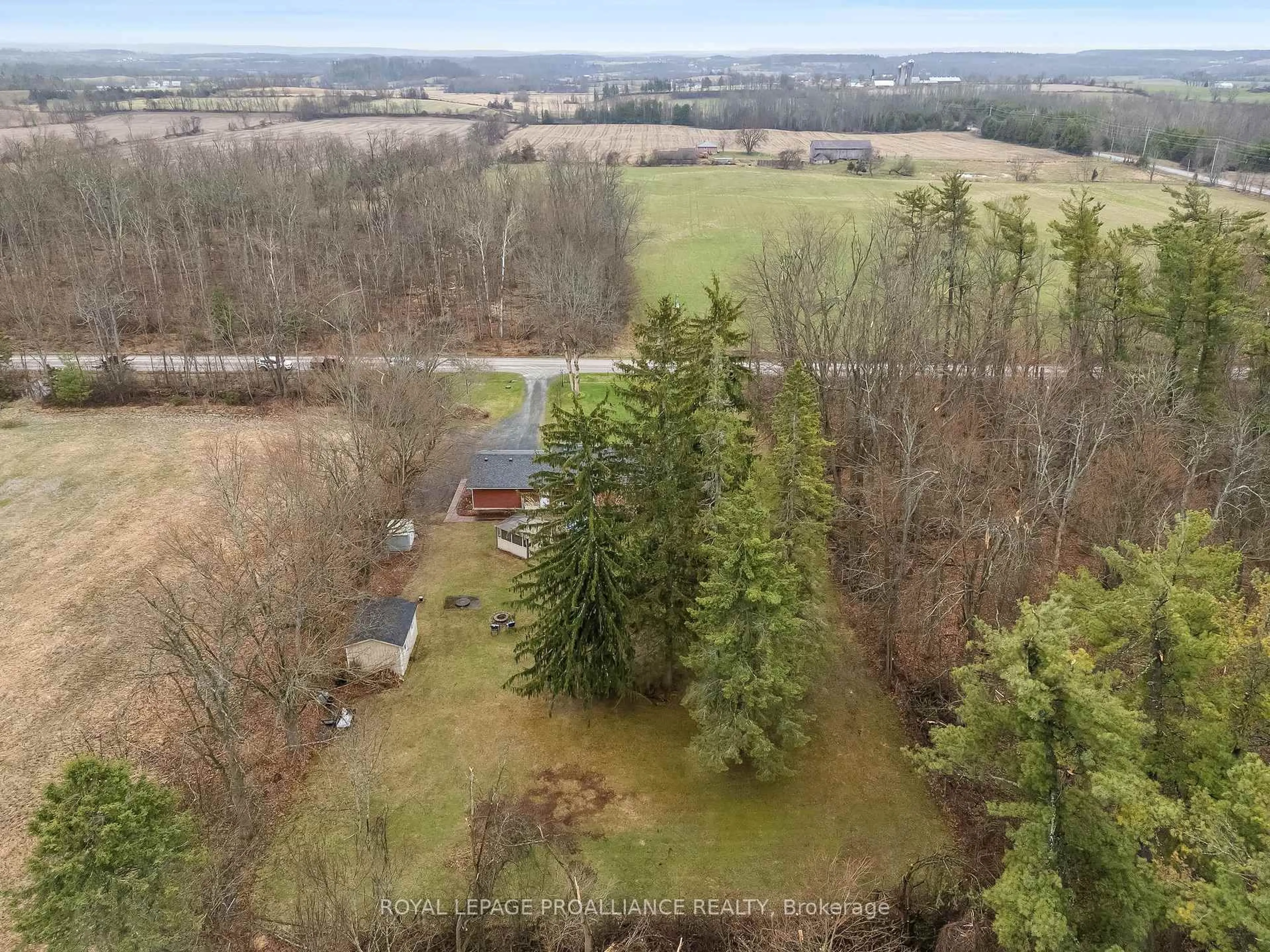 A pic from outside/outdoor area/front of a property/back of a property/a pic from drone, forest/trees view for 3282 10th Line, Trent Hills Ontario K0L 1L0