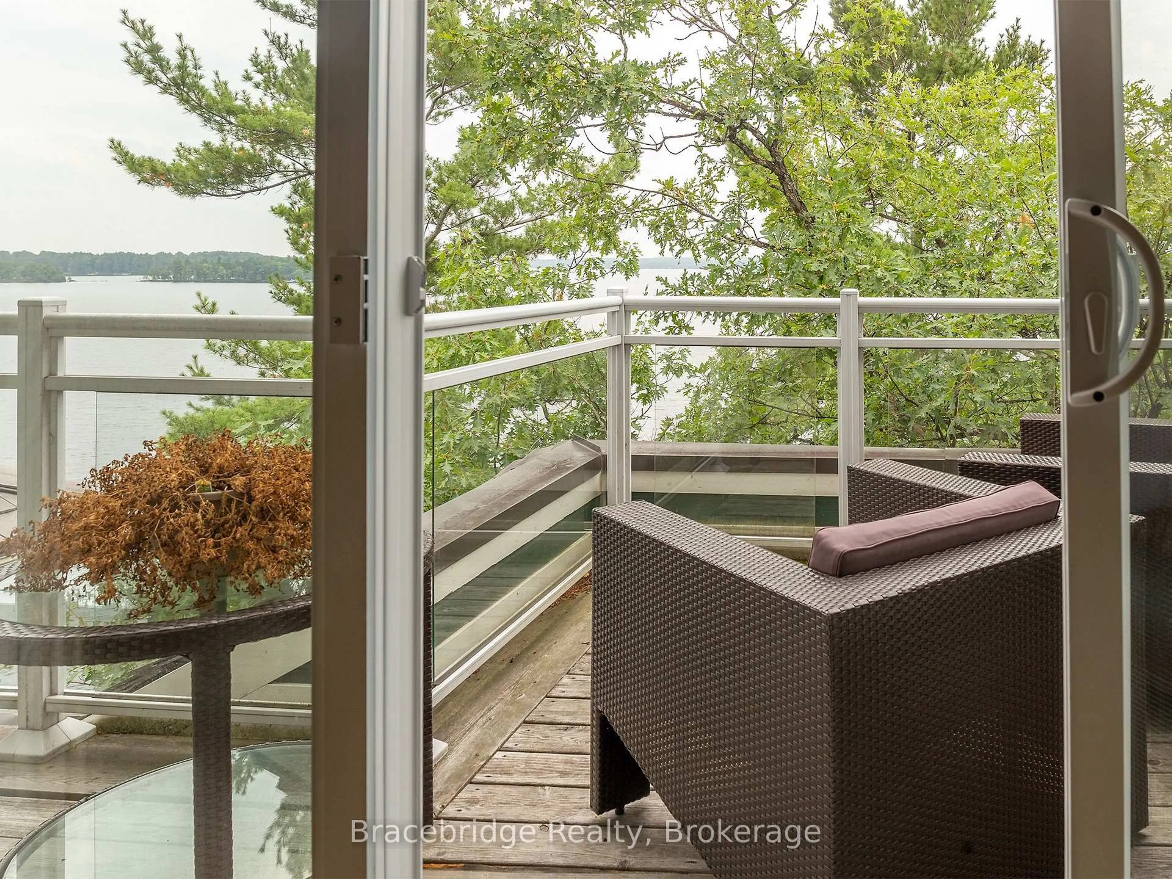 Balcony in the apartment, water/lake/river/ocean view for 1869 Muskoka Rd 118 Highway #A202-D1, Muskoka Lakes Ontario P1L 1W8