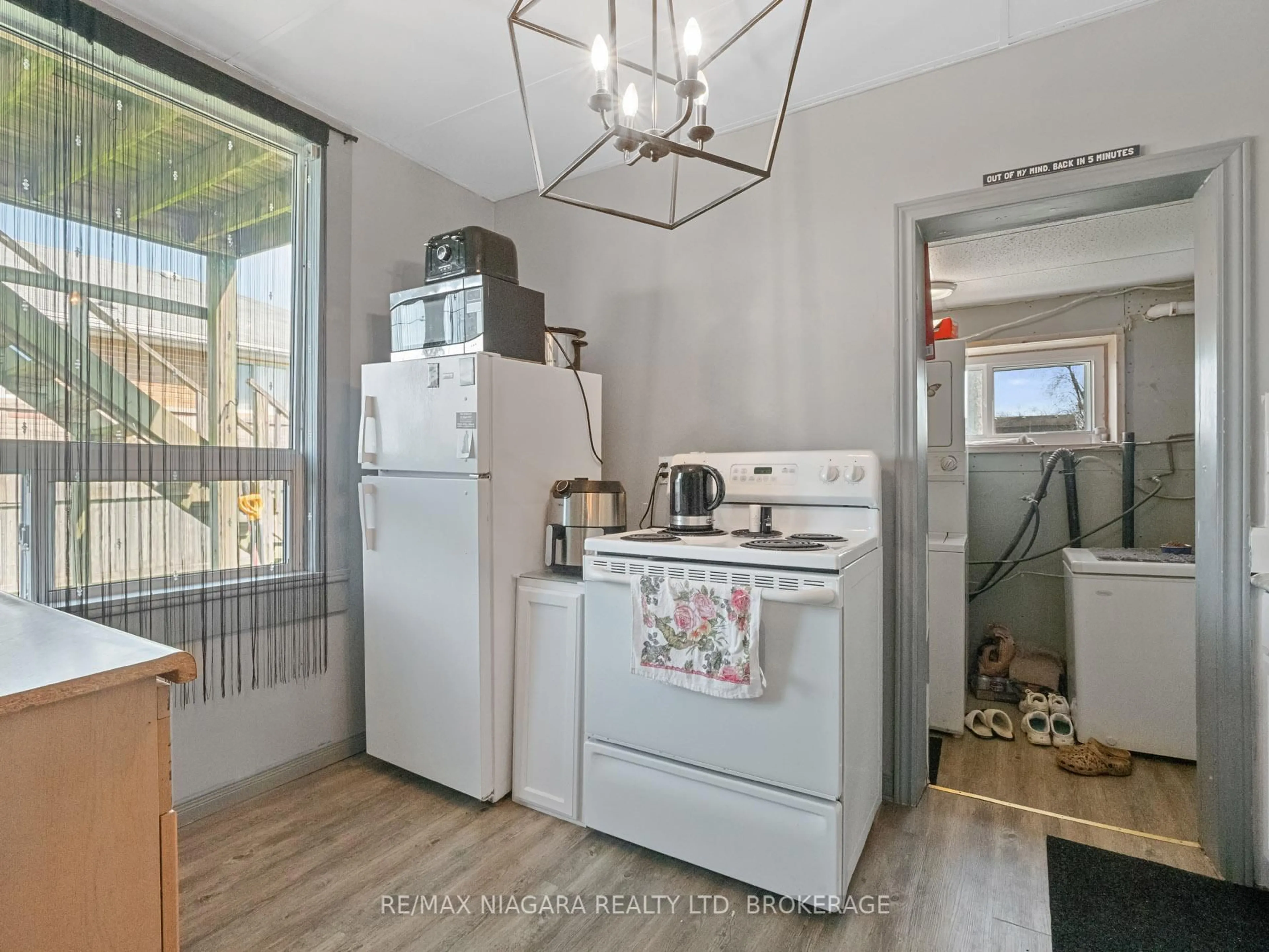 Kitchen with laundary machines, unknown for 245 Gilmore Rd, Fort Erie Ontario L2A 2M4