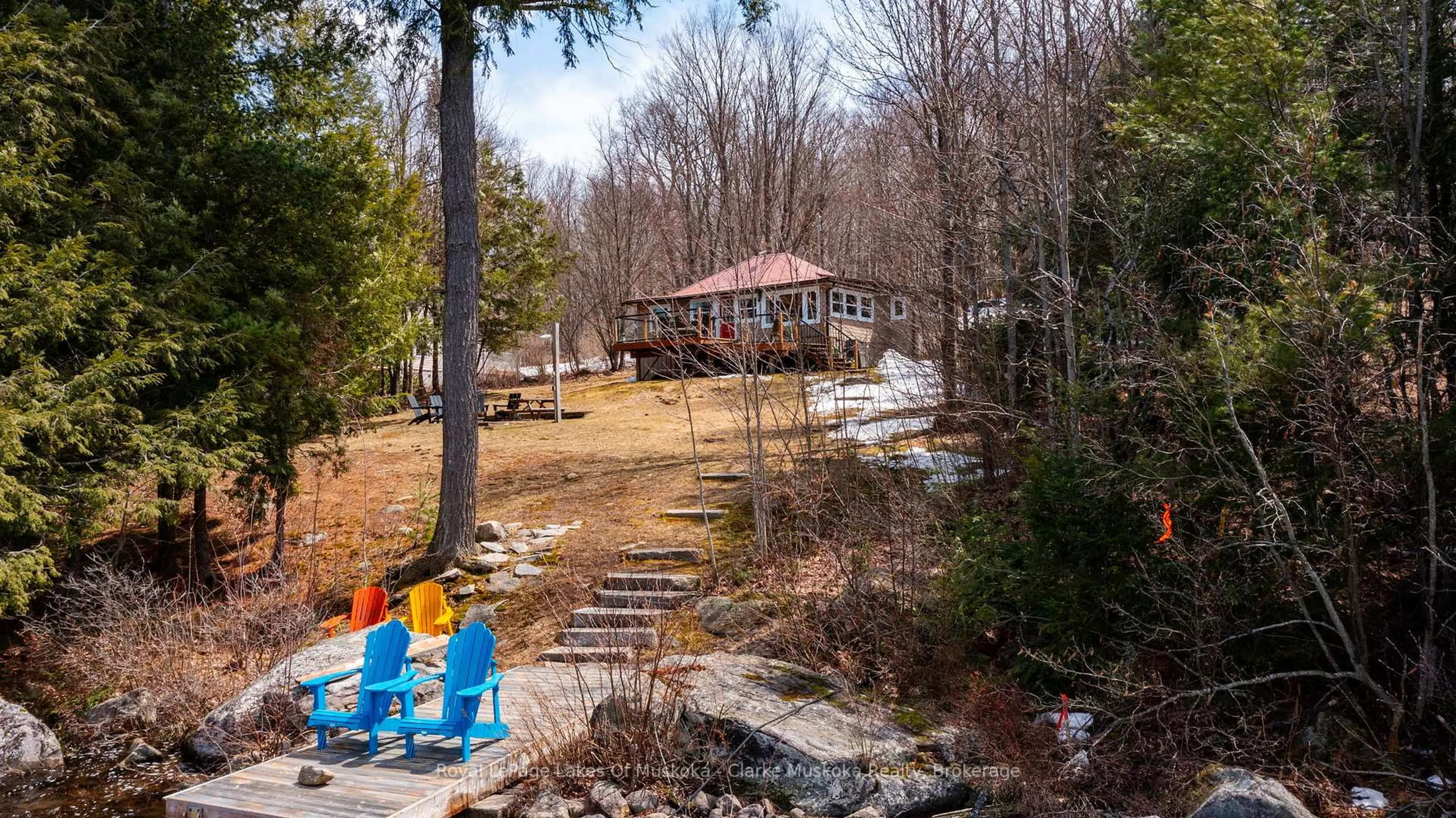 A pic from outside/outdoor area/front of a property/back of a property/a pic from drone, water/lake/river/ocean view for 112 BITTERN LAKE Lane, Perry Ontario P0A 1R0