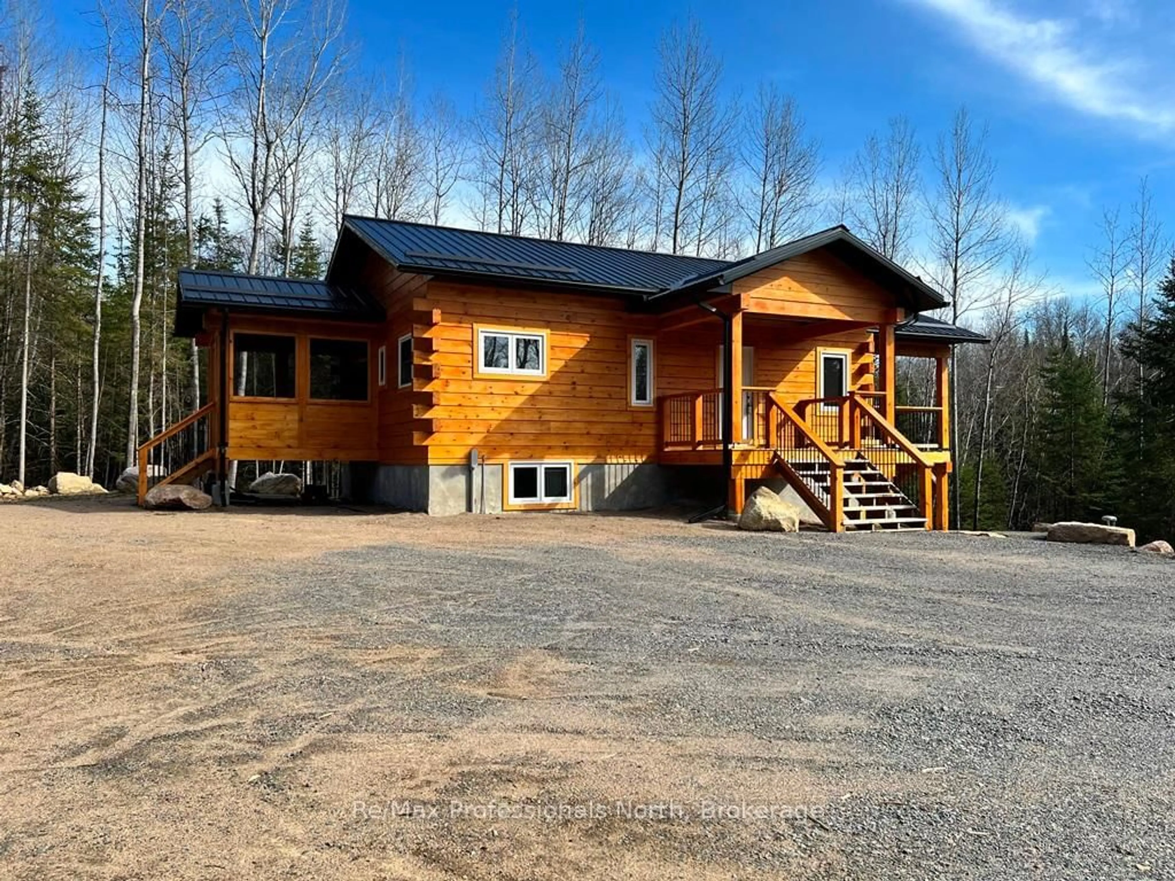 A pic from outside/outdoor area/front of a property/back of a property/a pic from drone, unknown for 6587 Elephant Lake Rd, Dysart et al Ontario K0L 1X0