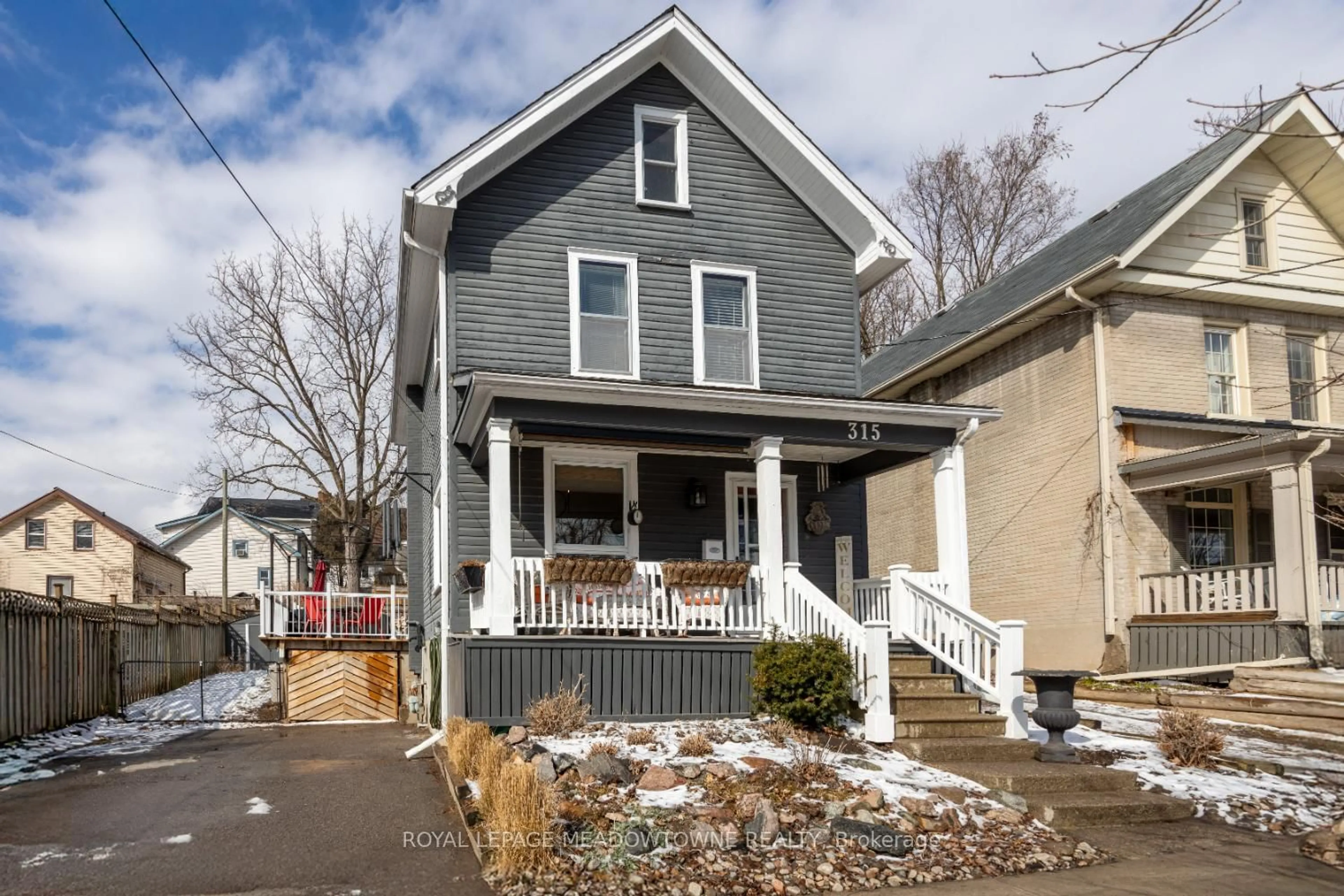 Home with vinyl exterior material, street for 315 Mark St, Peterborough East Ontario K9H 1V5