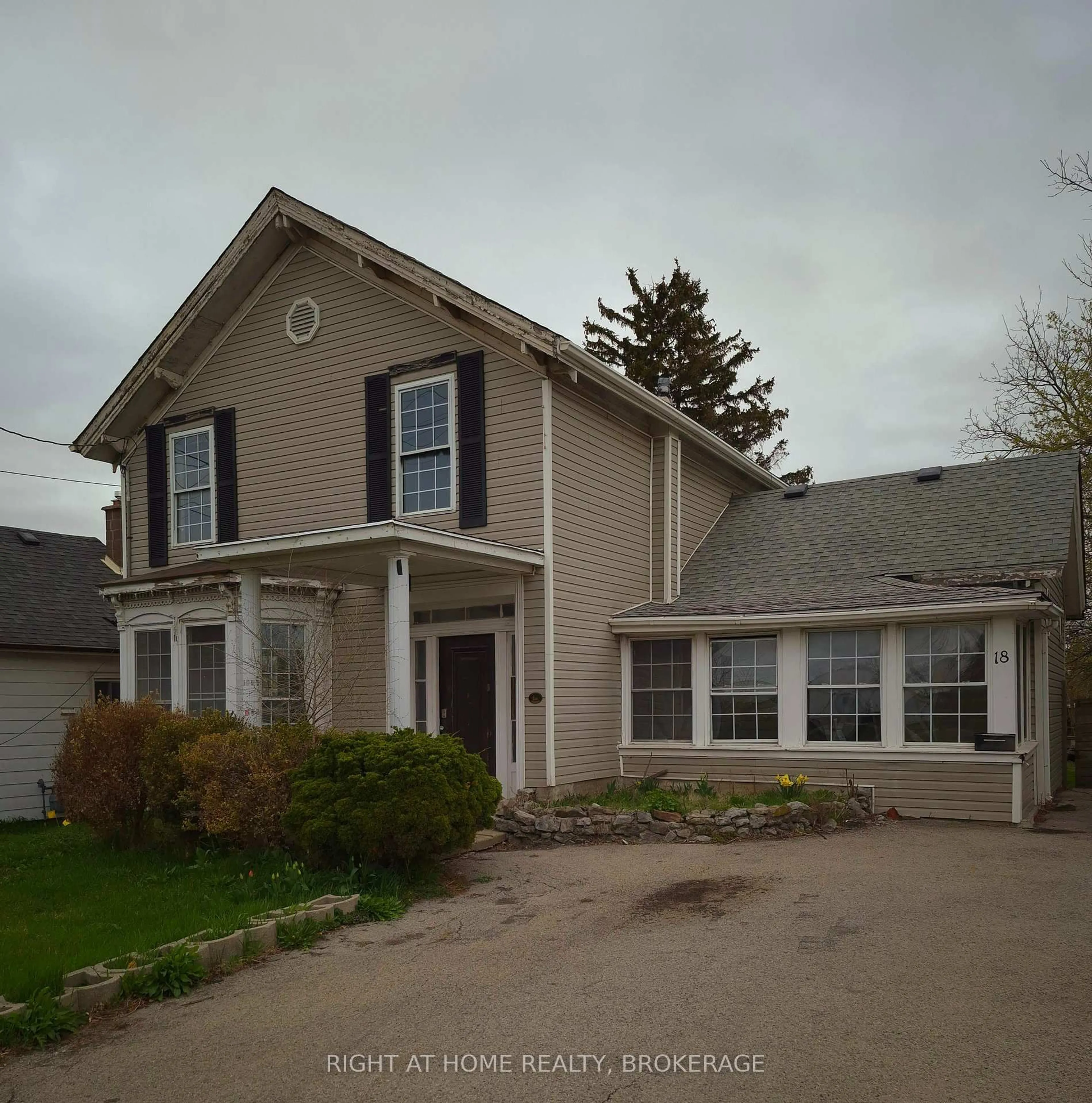 Home with vinyl exterior material, street for 18 Merritt St, St. Catharines Ontario L2T 1J3
