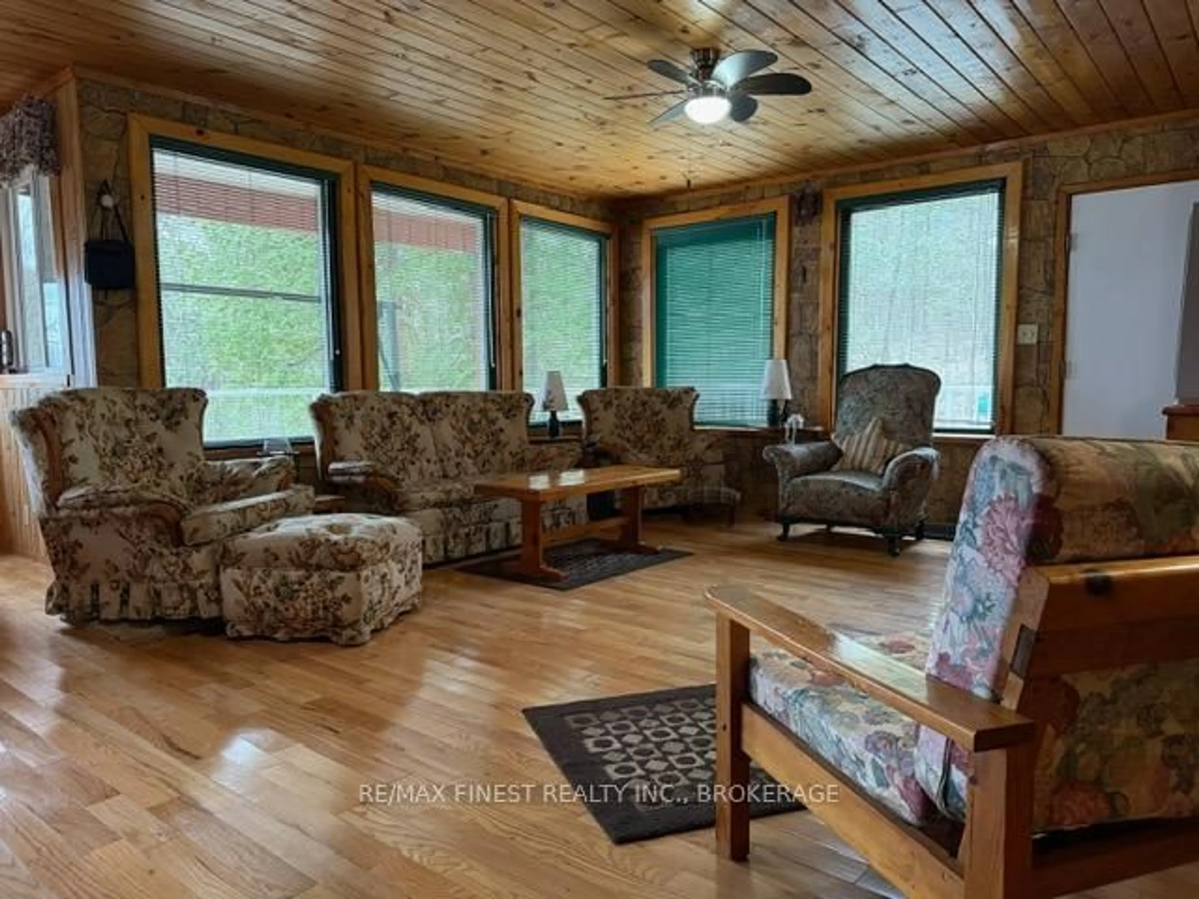 Living room with furniture, wood/laminate floor for 9 Underside Lane, Godfrey Ontario K0H 1T0