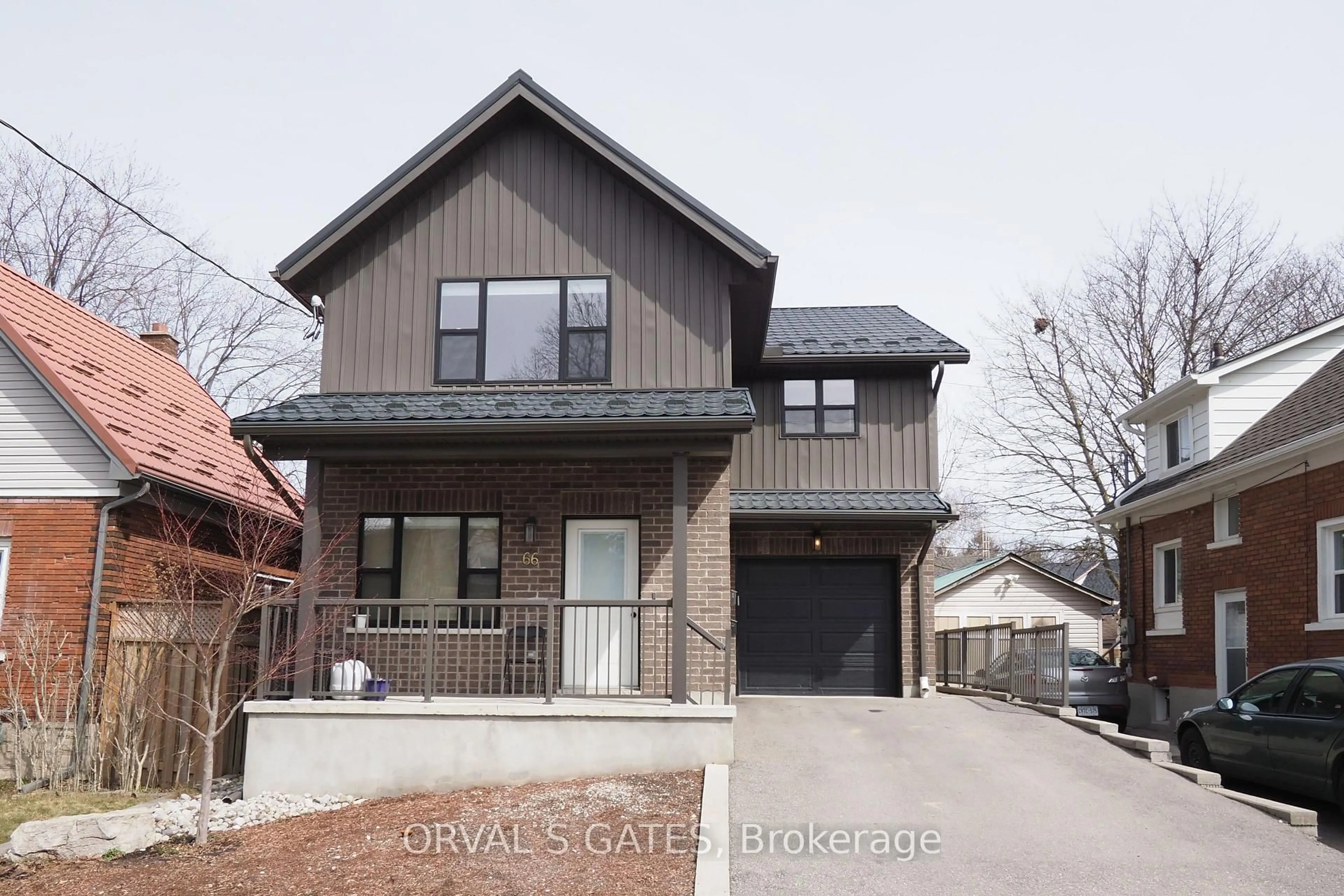 Home with brick exterior material, street for 66 West Ave, Kitchener Ontario N2M 1X6