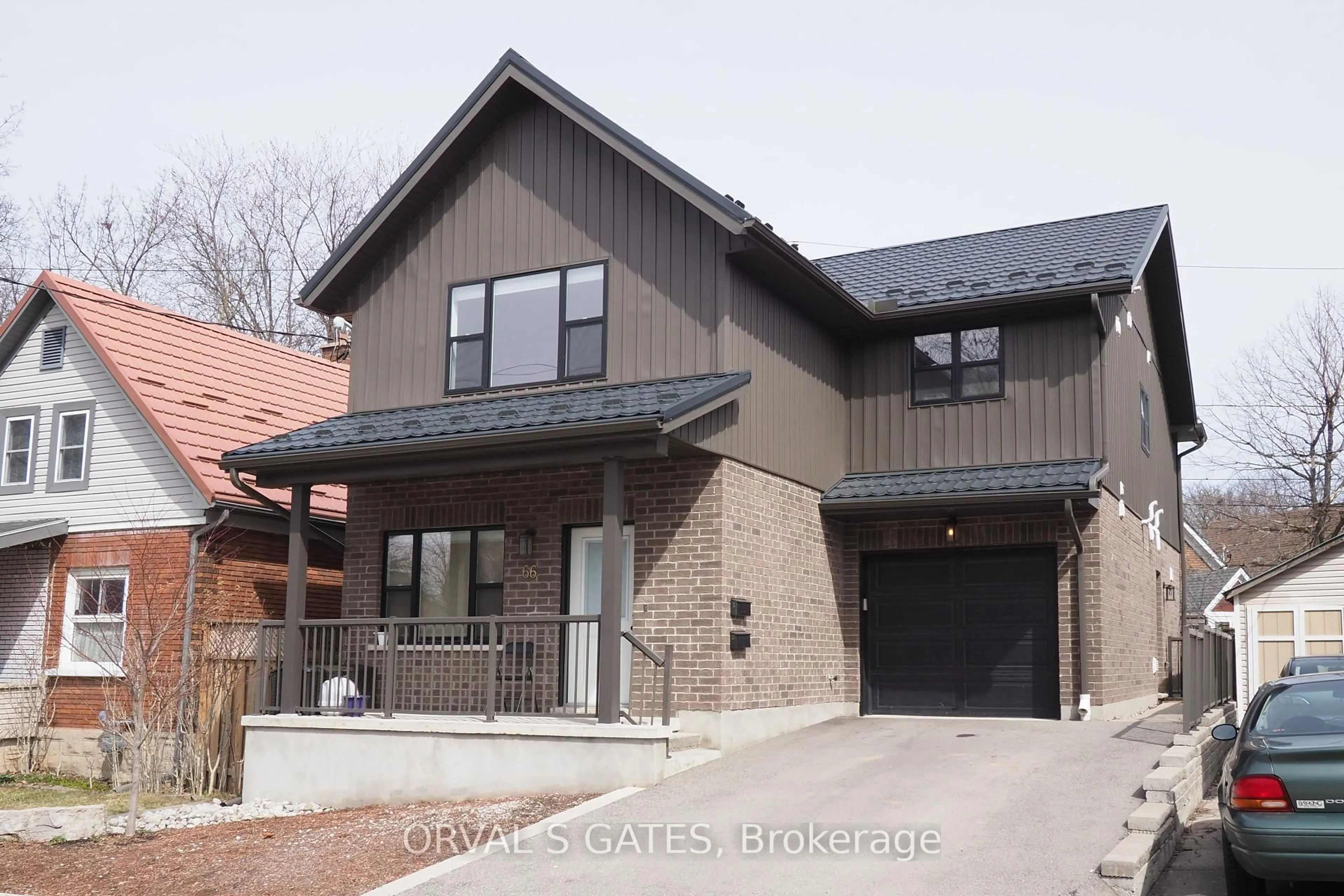 Home with brick exterior material, street for 66 West Ave, Kitchener Ontario N2M 1X6