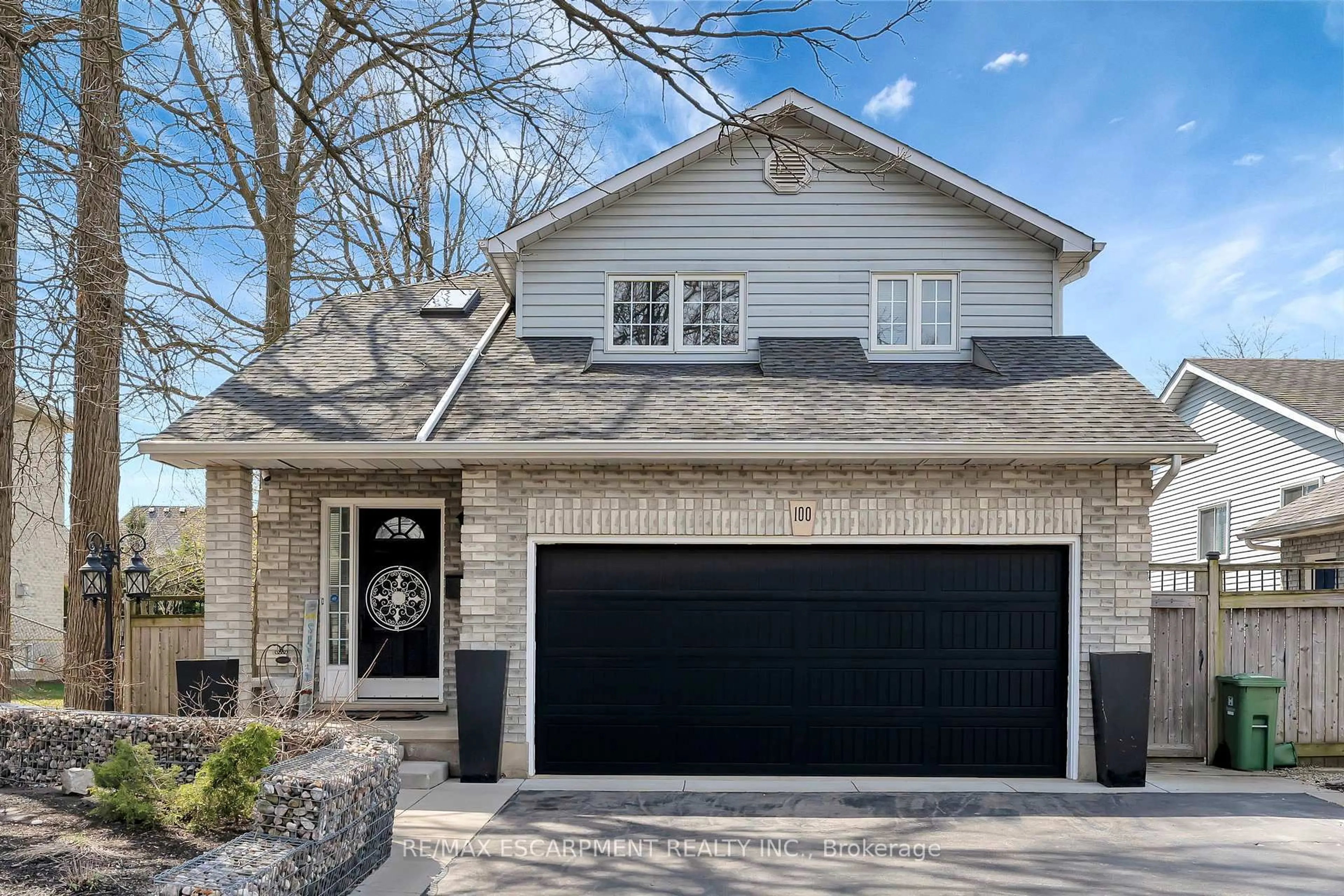 Home with brick exterior material, street for 100 Stone Church Rd, Hamilton Ontario L9B 1A9
