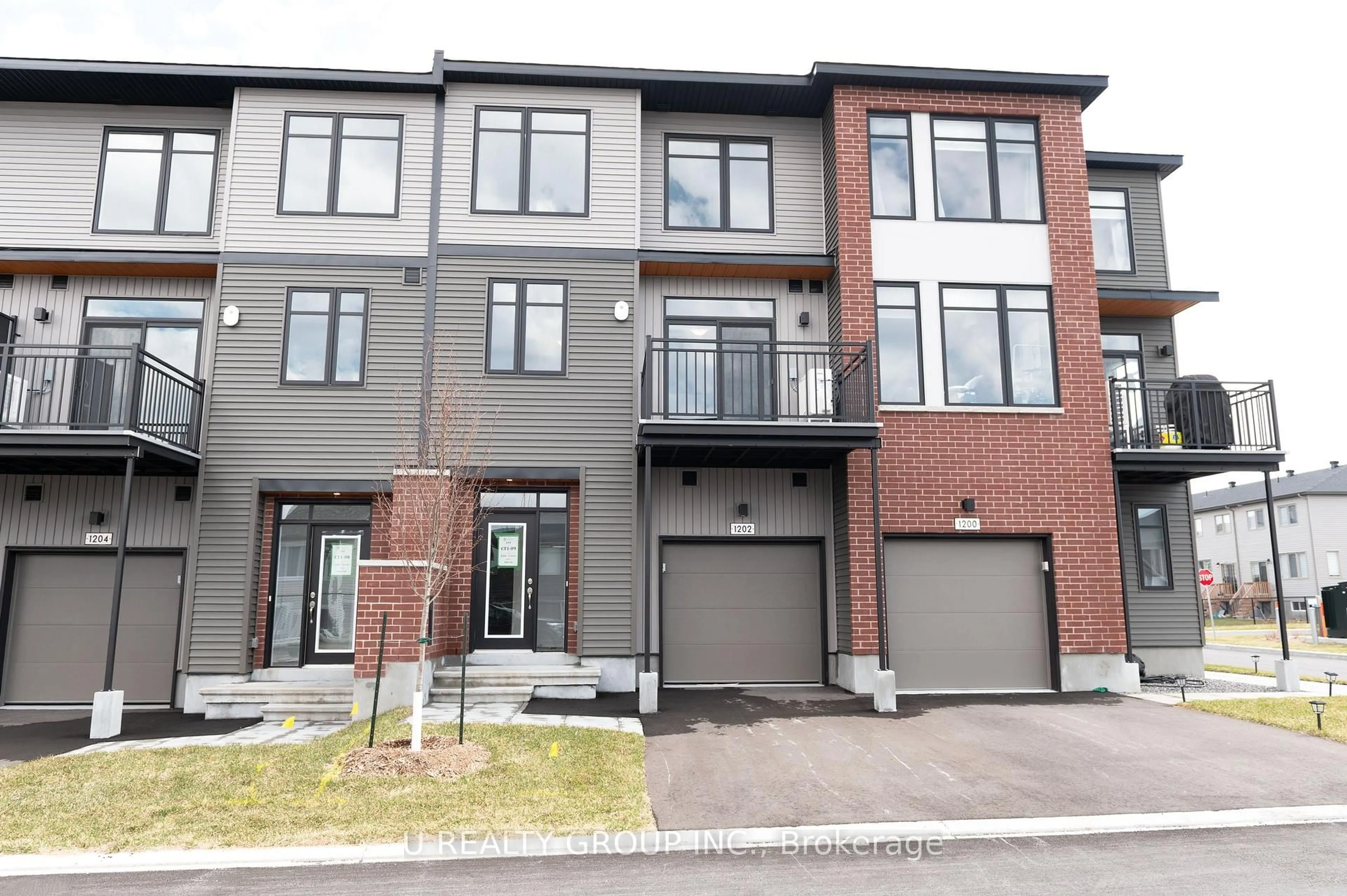 Home with brick exterior material, street for 1202 Flycatcher Private, Ottawa Ontario K1X 0M7
