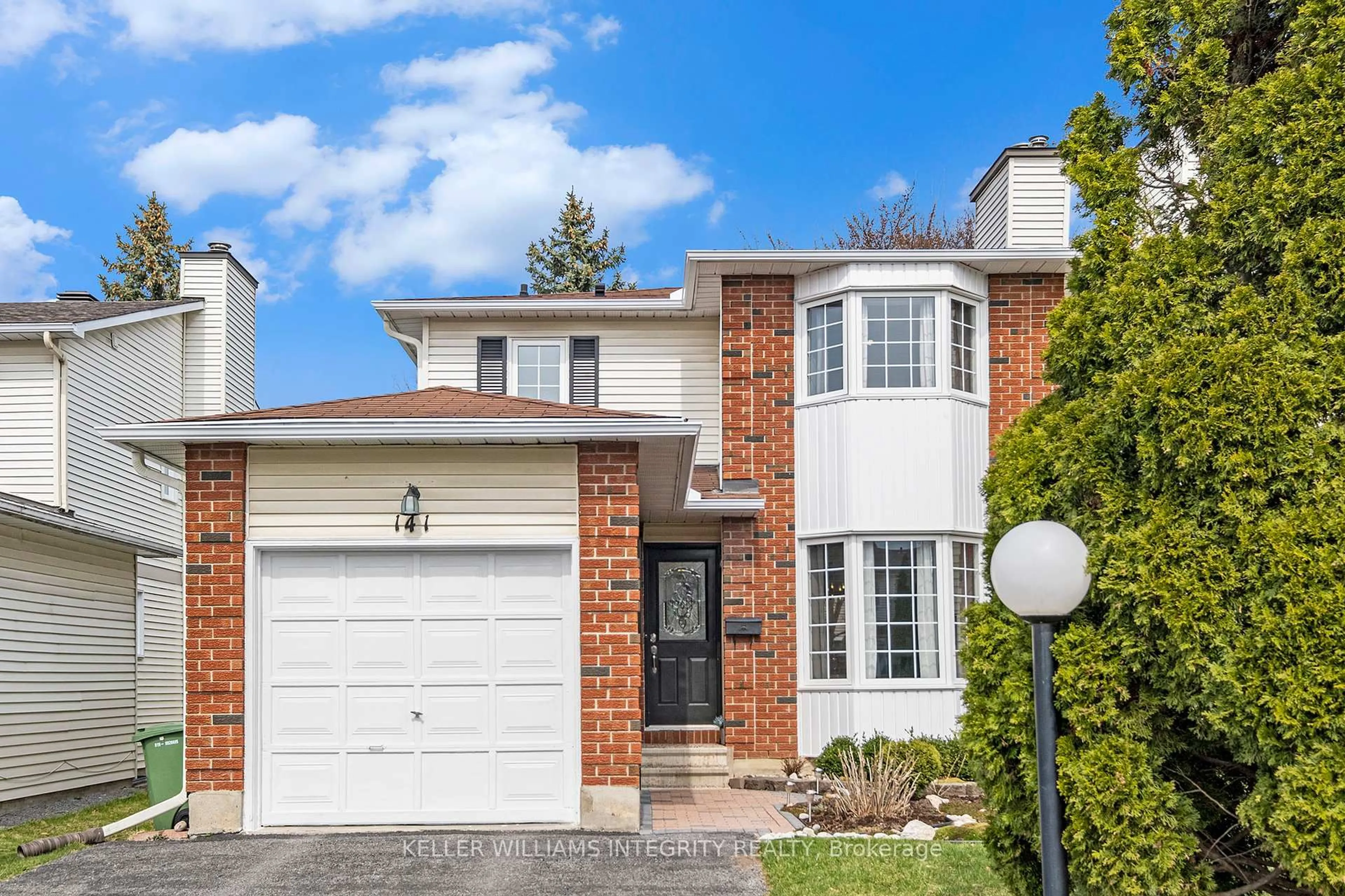 Home with brick exterior material, street for 141 Shearer Cres, Kanata Ontario K2L 3W2