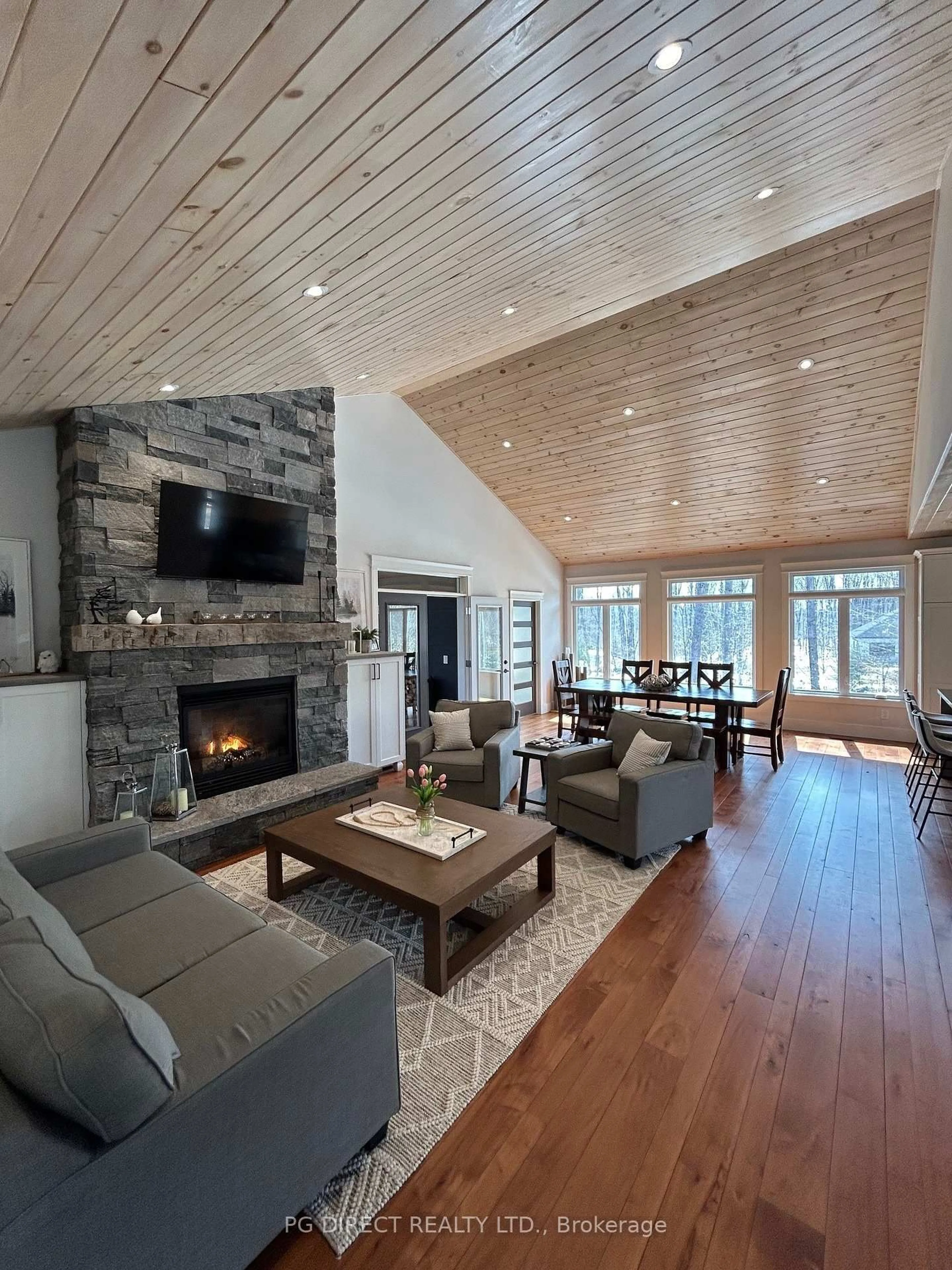 Living room with furniture, wood/laminate floor for 2 Hawk Ridge Crt, Huntsville Ontario P1H 0A7