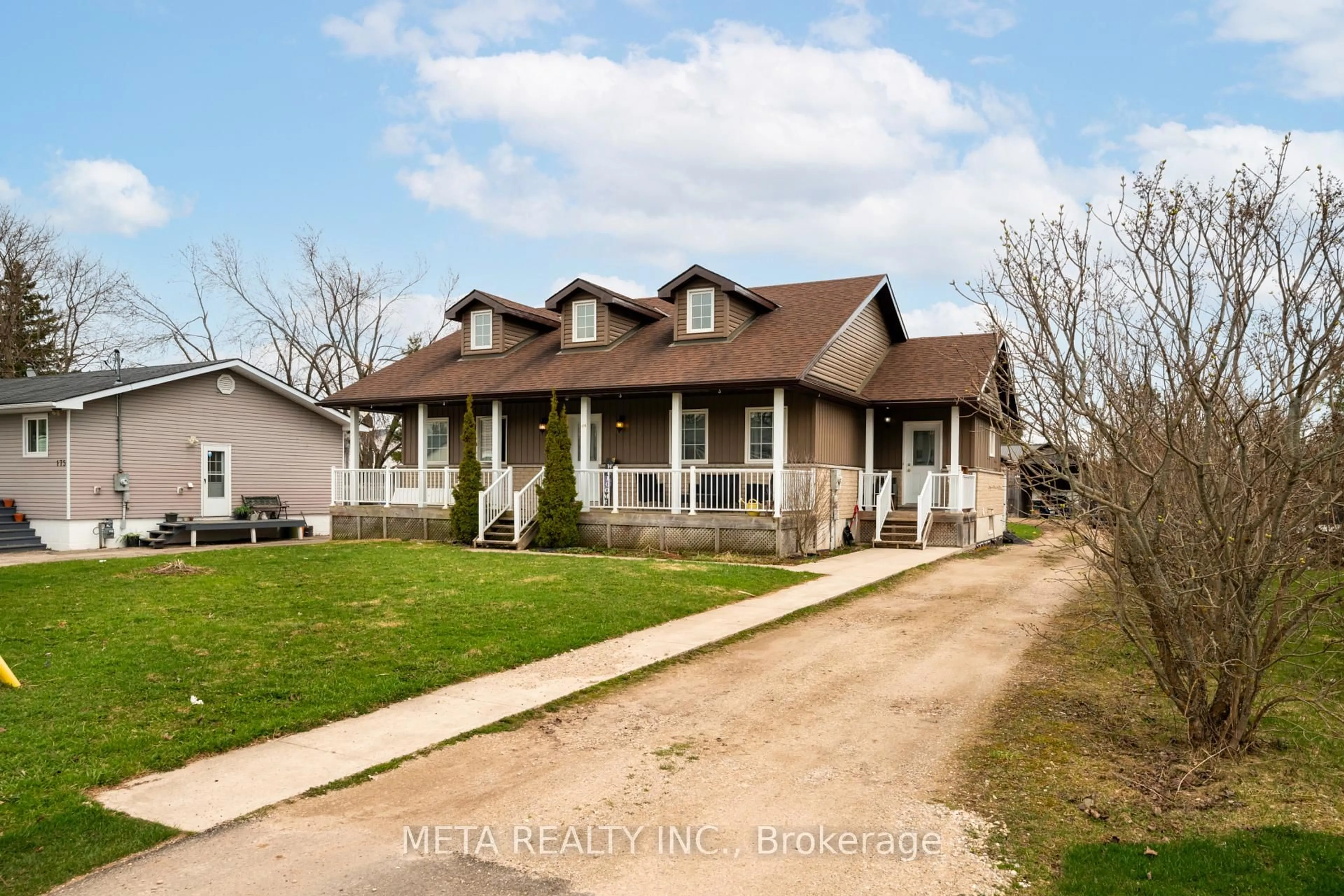 Home with vinyl exterior material, street for 176 Victoria St, Southgate Ontario N0C 1B0