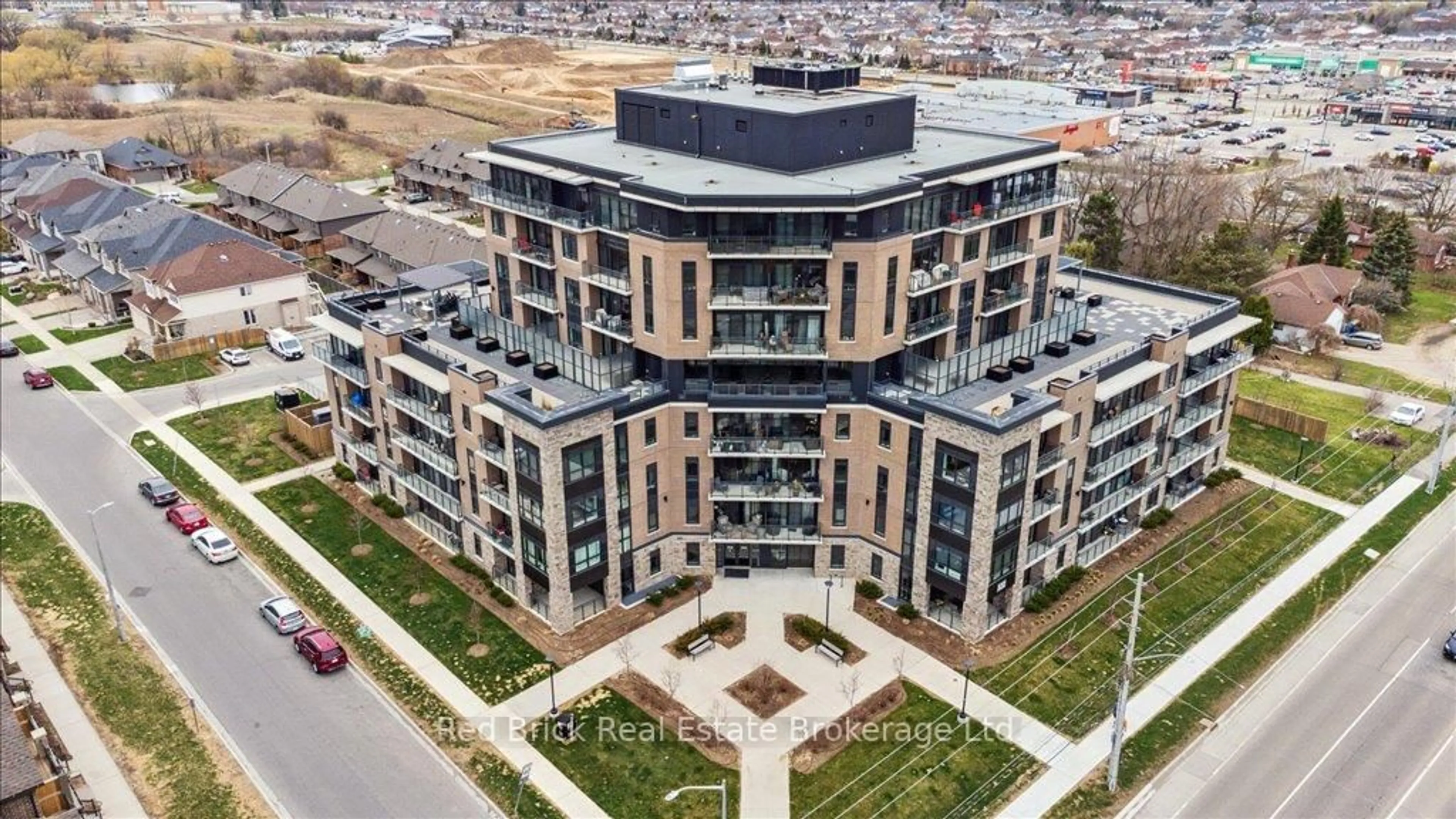 A pic from outside/outdoor area/front of a property/back of a property/a pic from drone, city buildings view from balcony for 332 Gosling Gdns #403, Guelph Ontario N1L 1G7