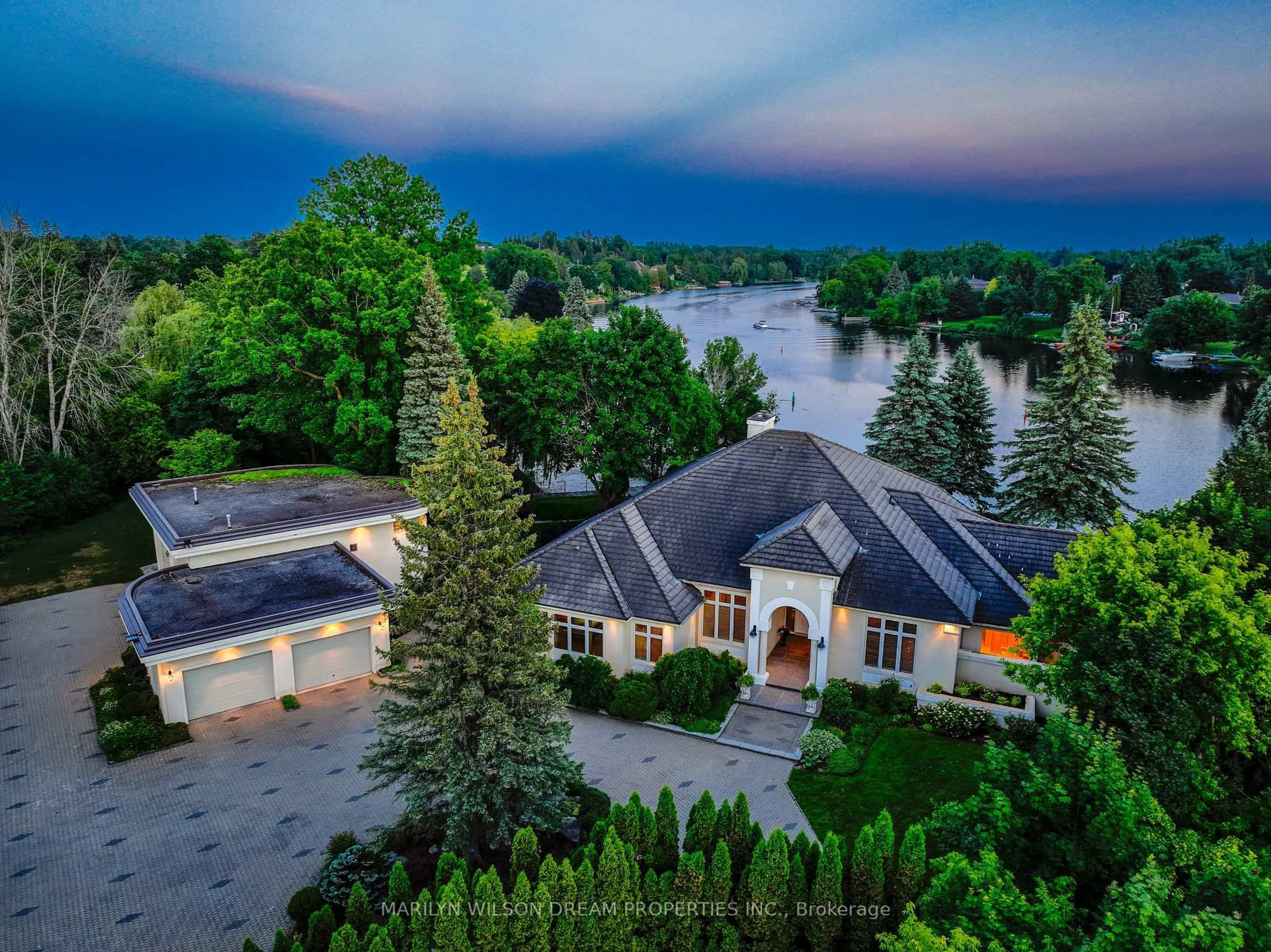 A pic from outside/outdoor area/front of a property/back of a property/a pic from drone, water/lake/river/ocean view for 1018 Kitoman Cres, Ottawa Ontario K4M 1K4