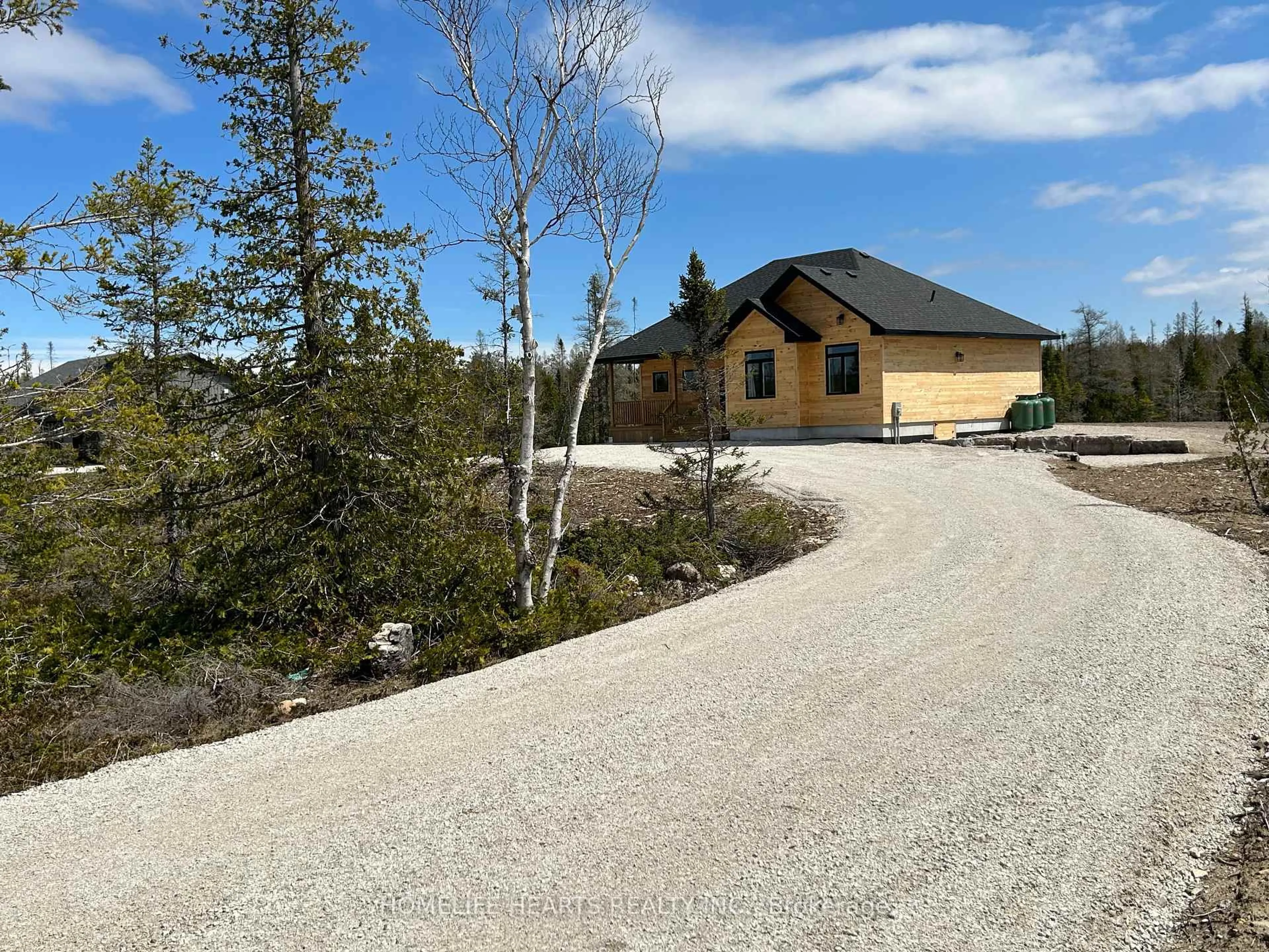 A pic from outside/outdoor area/front of a property/back of a property/a pic from drone, mountain view for 629 Lindsay Rd #30, Northern Bruce Peninsula Ontario N0H 1Z0