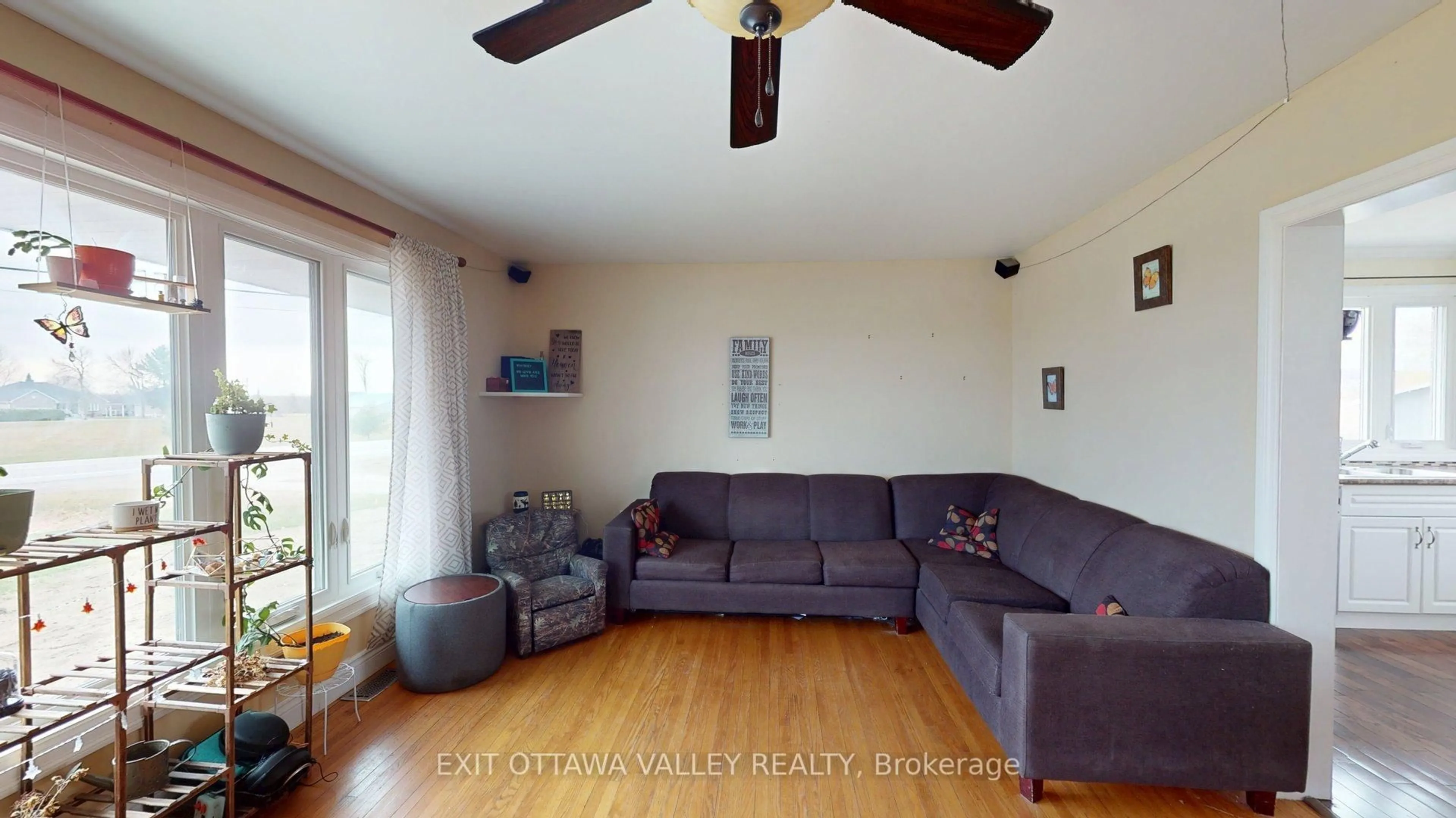 Living room with furniture, wood/laminate floor for 2047 Lapasse Rd, Beachburg Ontario K0J 1C0