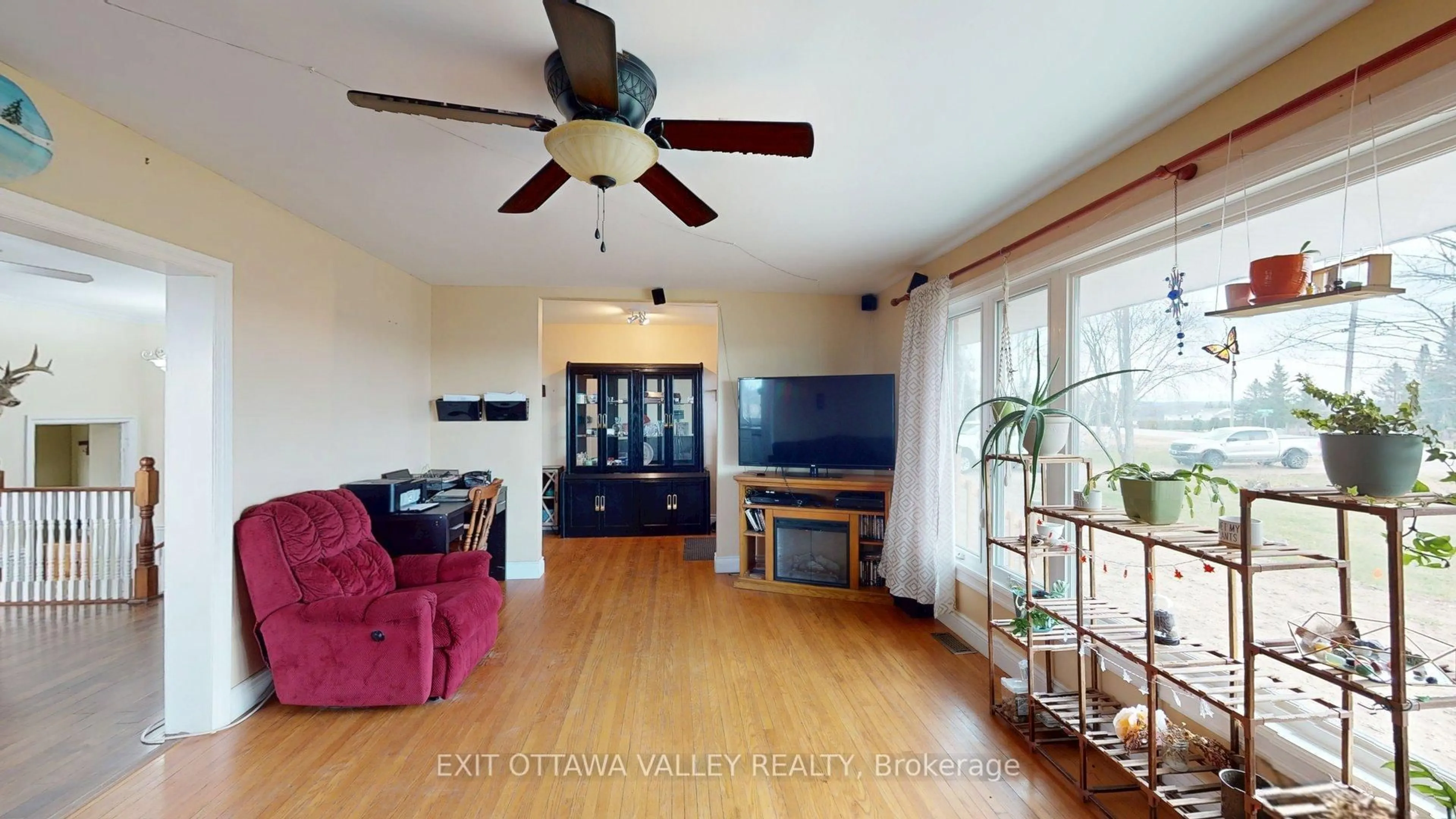 Living room with furniture, wood/laminate floor for 2047 Lapasse Rd, Beachburg Ontario K0J 1C0