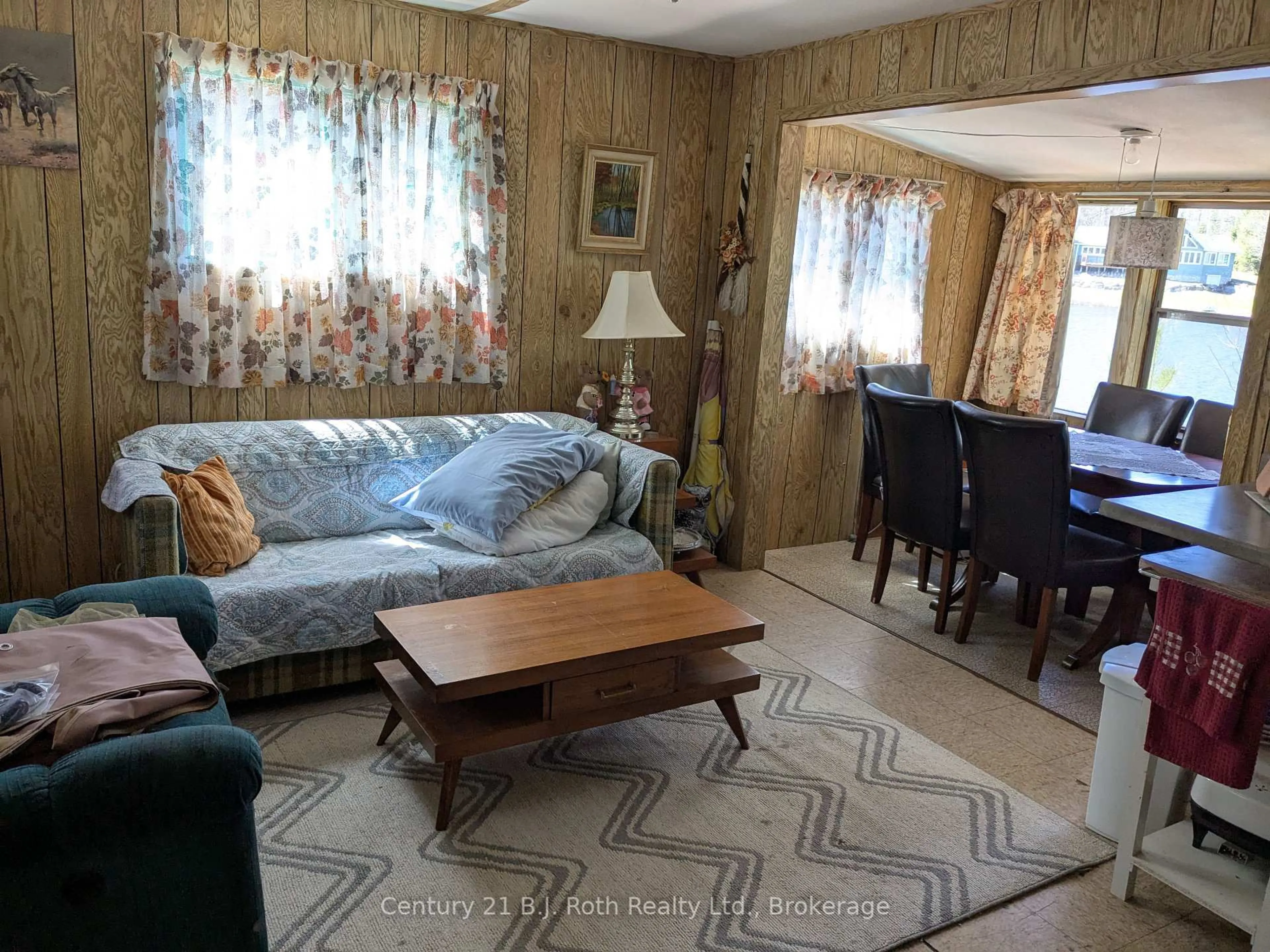 Living room with furniture, unknown for 16 Machar Pt, South River Ontario P0A 1X0