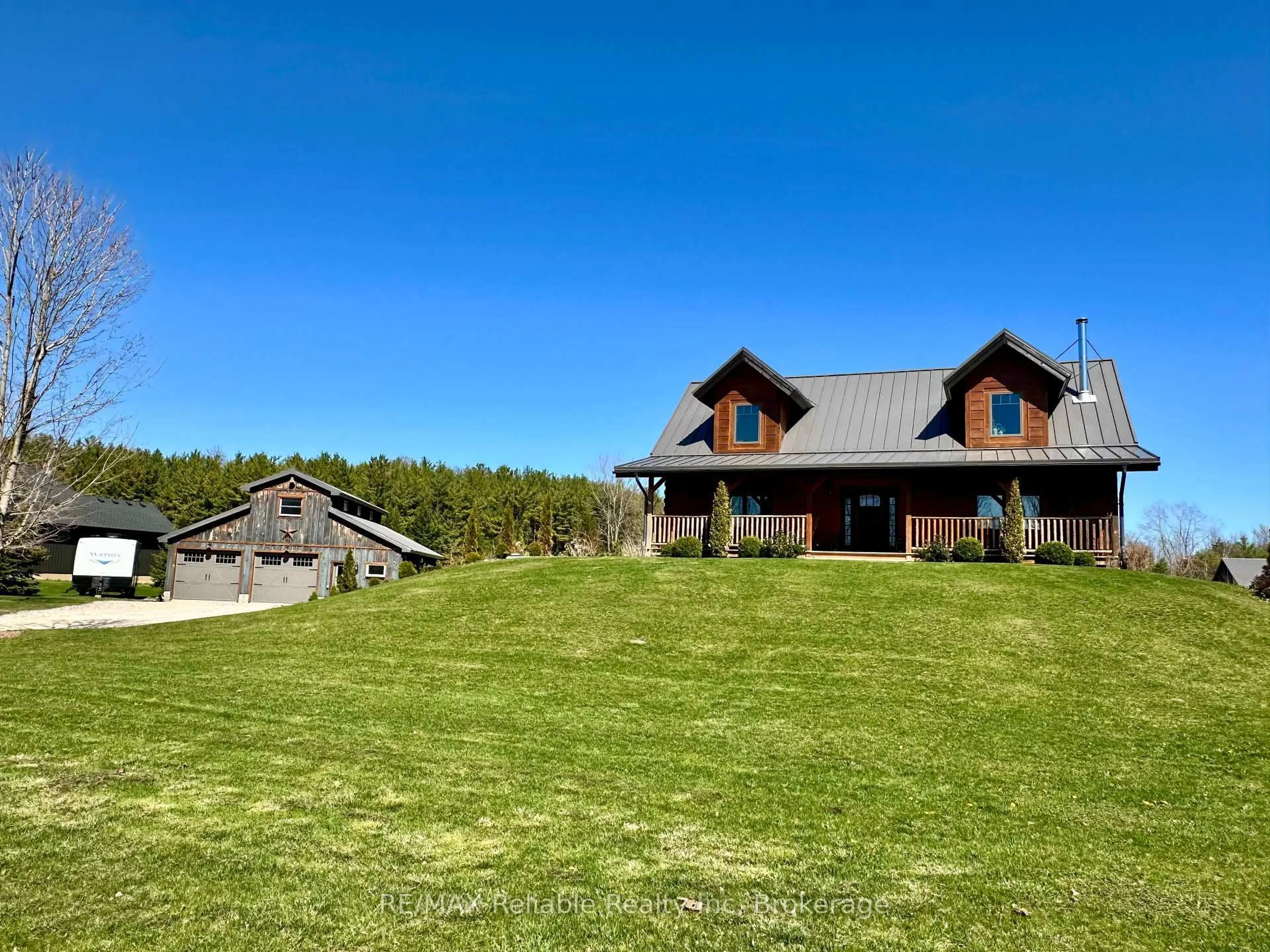 A pic from outside/outdoor area/front of a property/back of a property/a pic from drone, mountain view for 76630 Wildwood Line, Bluewater Ontario N0M 1G0