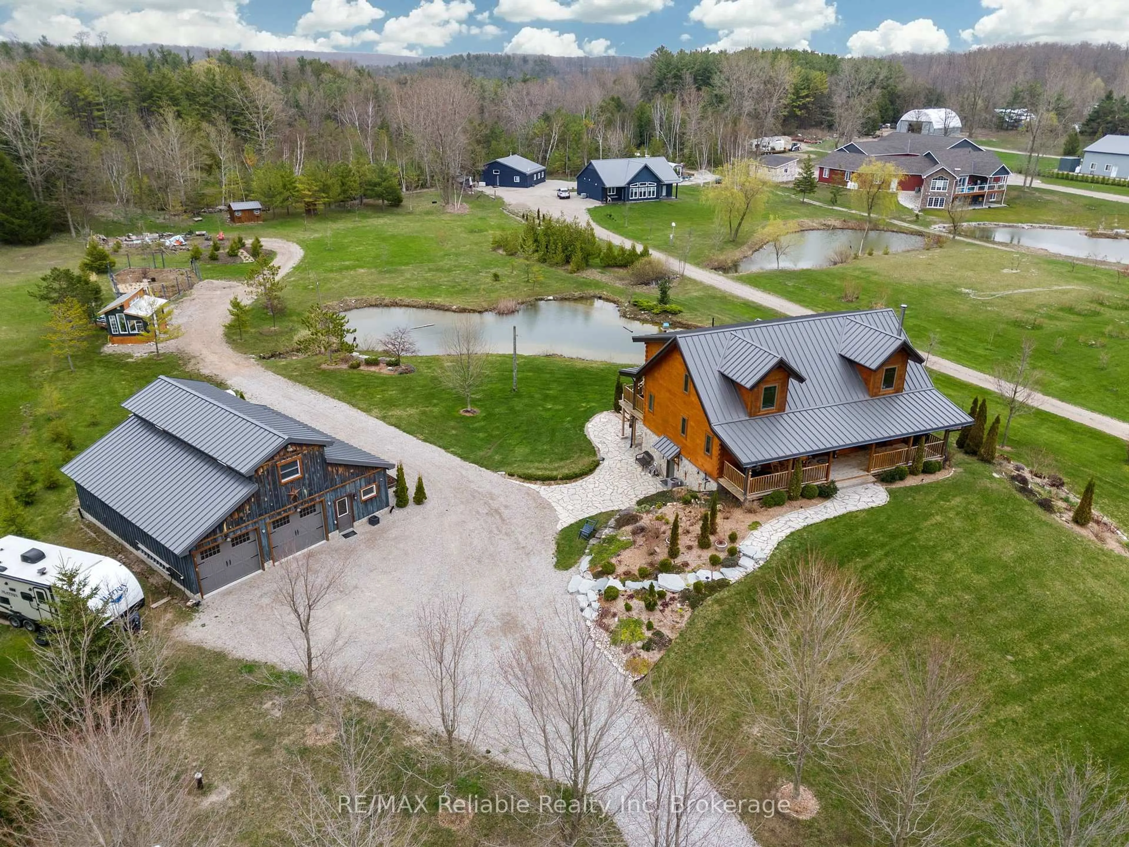 A pic from outside/outdoor area/front of a property/back of a property/a pic from drone, mountain view for 76630 Wildwood Line, Bluewater Ontario N0M 1G0