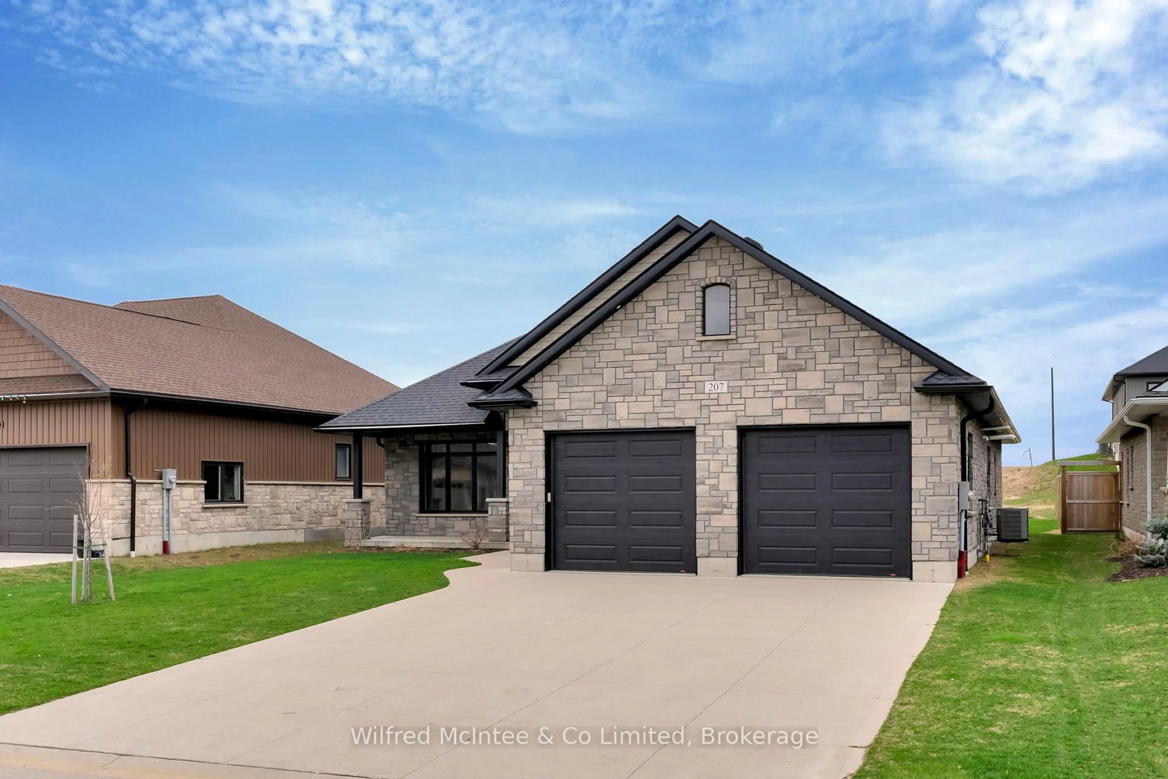 Home with brick exterior material, street for 207 Irishwood Lane, Brockton Ontario N0G 2V0