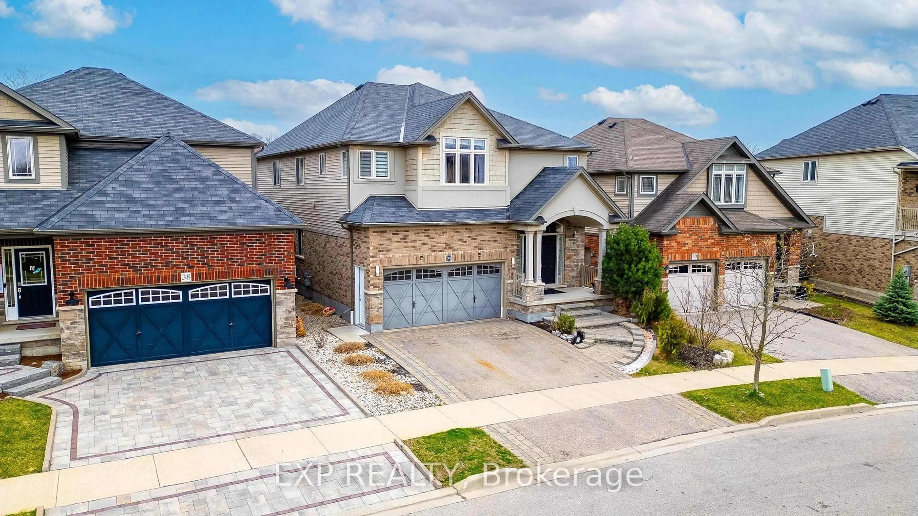 Home with brick exterior material, street for 34 Adencliffe St, Kitchener Ontario N2R 0B5