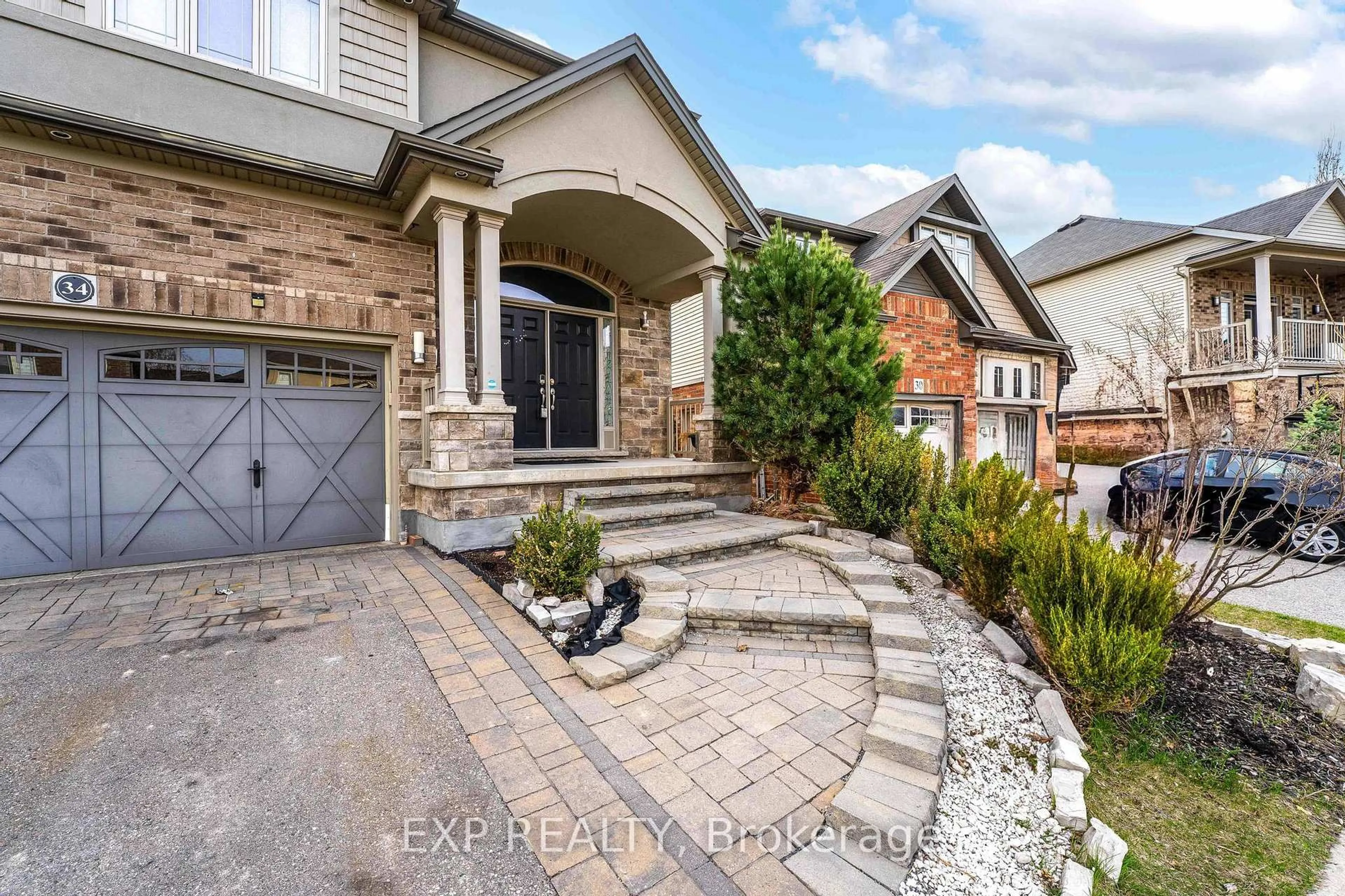 Home with brick exterior material, street for 34 Adencliffe St, Kitchener Ontario N2R 0B5