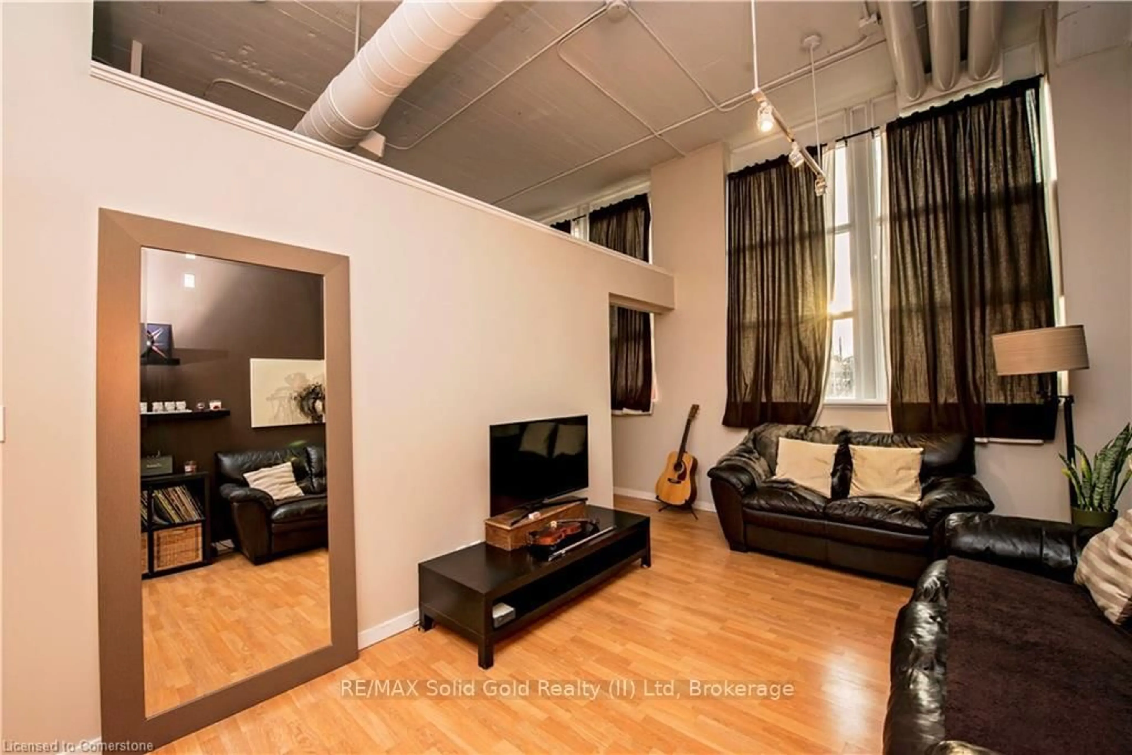 Living room with furniture, unknown for 410 King St #124, Kitchener Ontario N2G 1C3