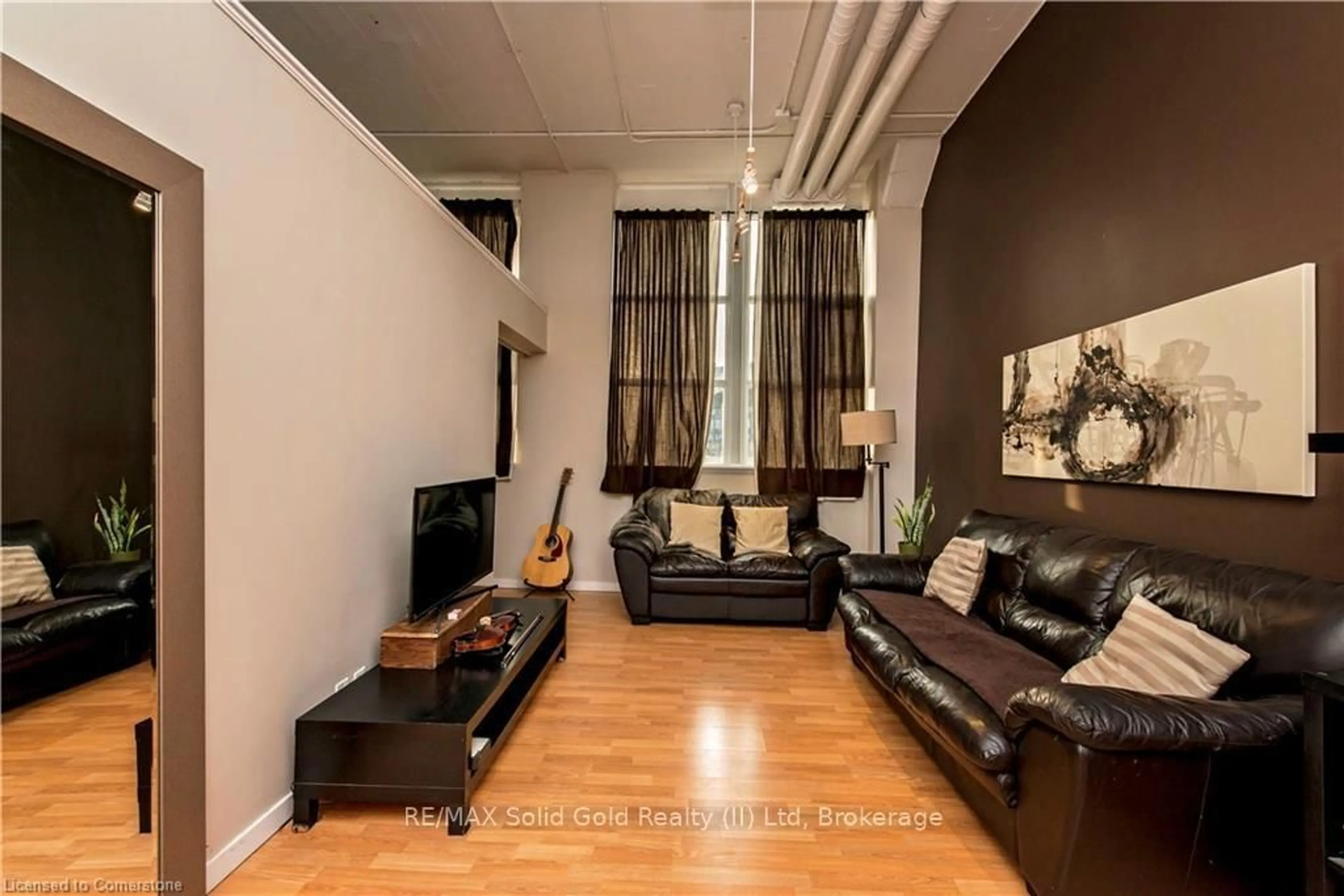 Living room with furniture, unknown for 410 King St #124, Kitchener Ontario N2G 1C3