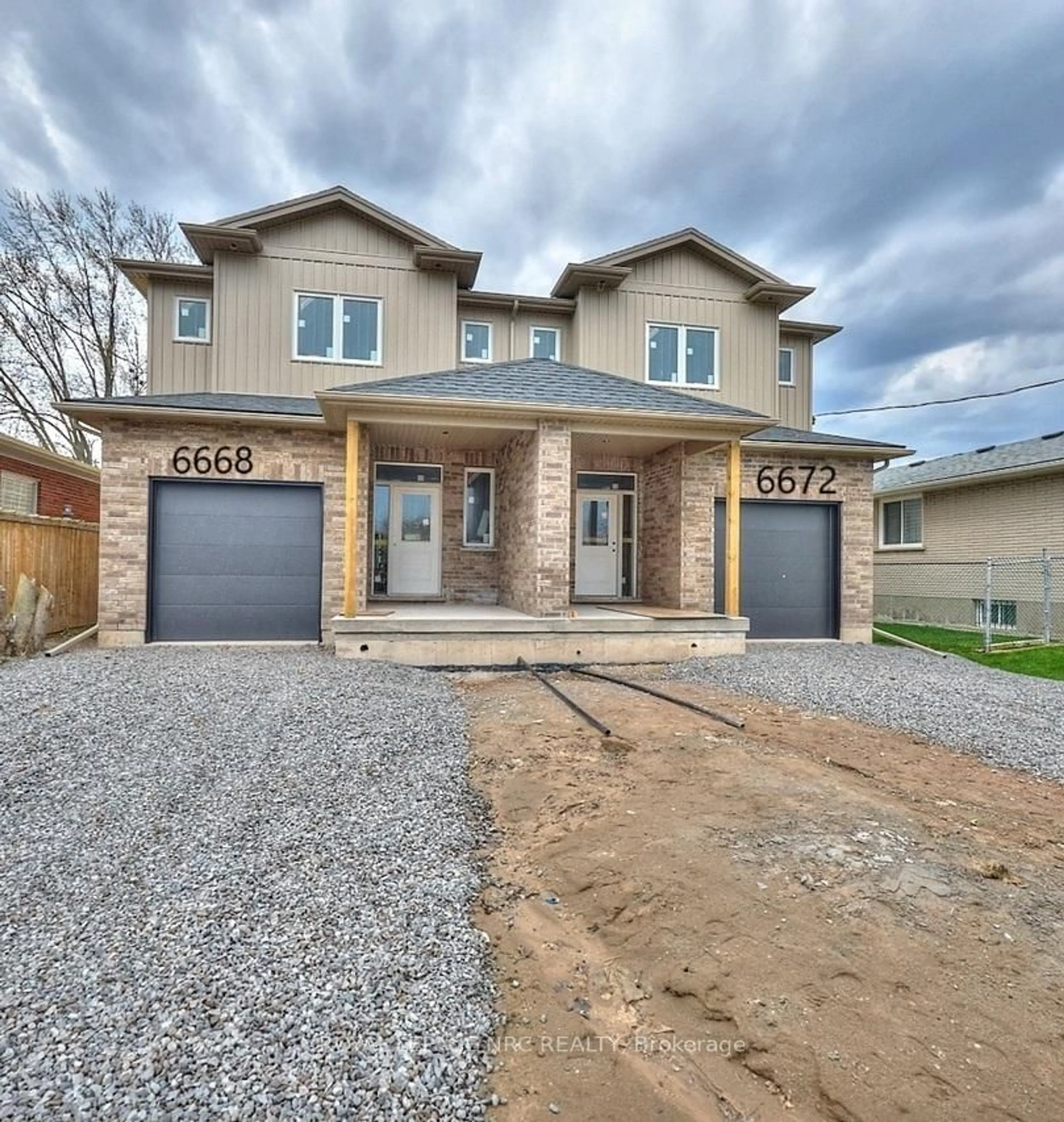 Home with brick exterior material, street for 6668 Hawkins St, Niagara Falls Ontario L2G 3B7