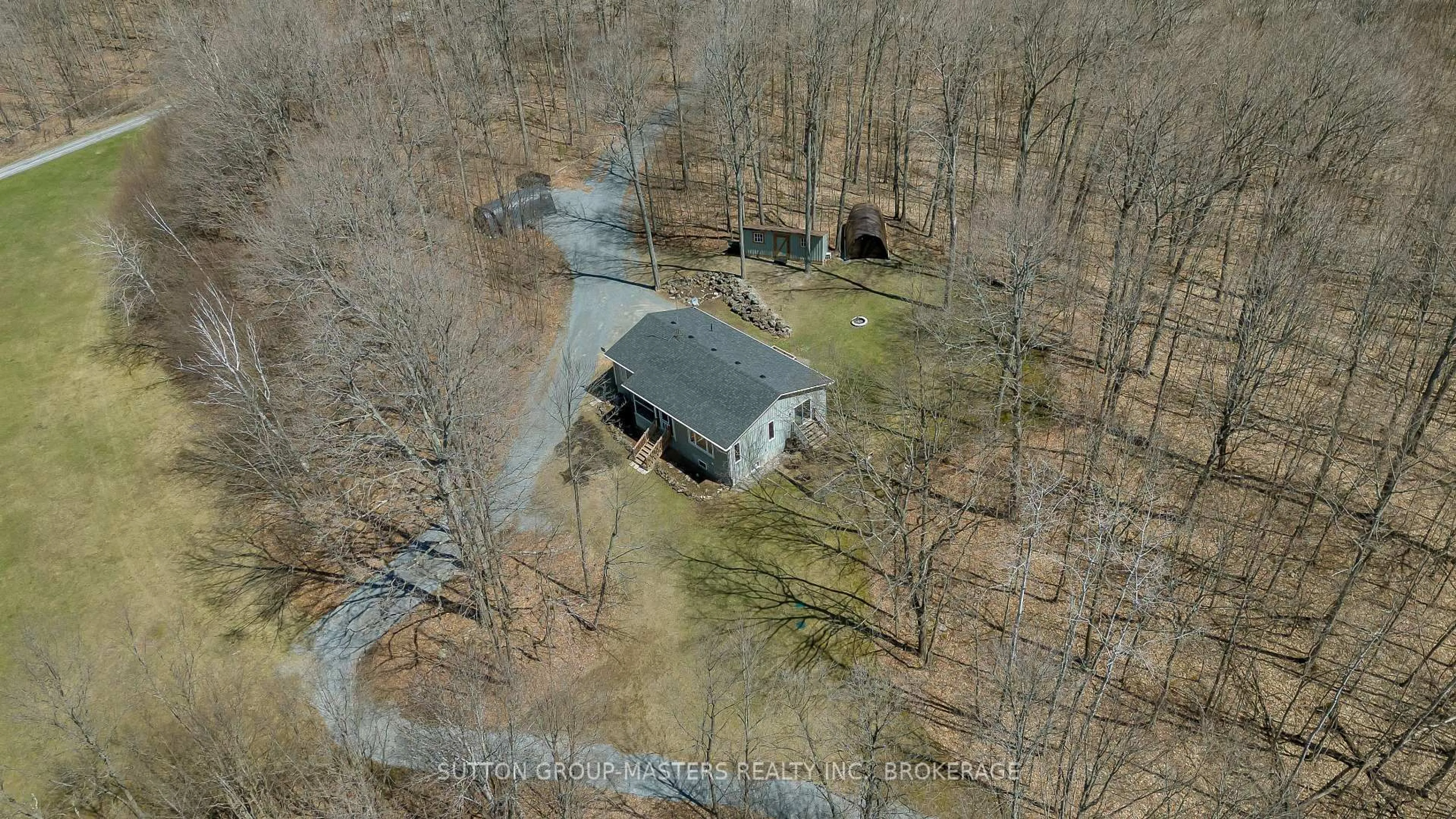 A pic from outside/outdoor area/front of a property/back of a property/a pic from drone, unknown for 324 13 Island Lake Lane, Godfrey Ontario K0H 1T0