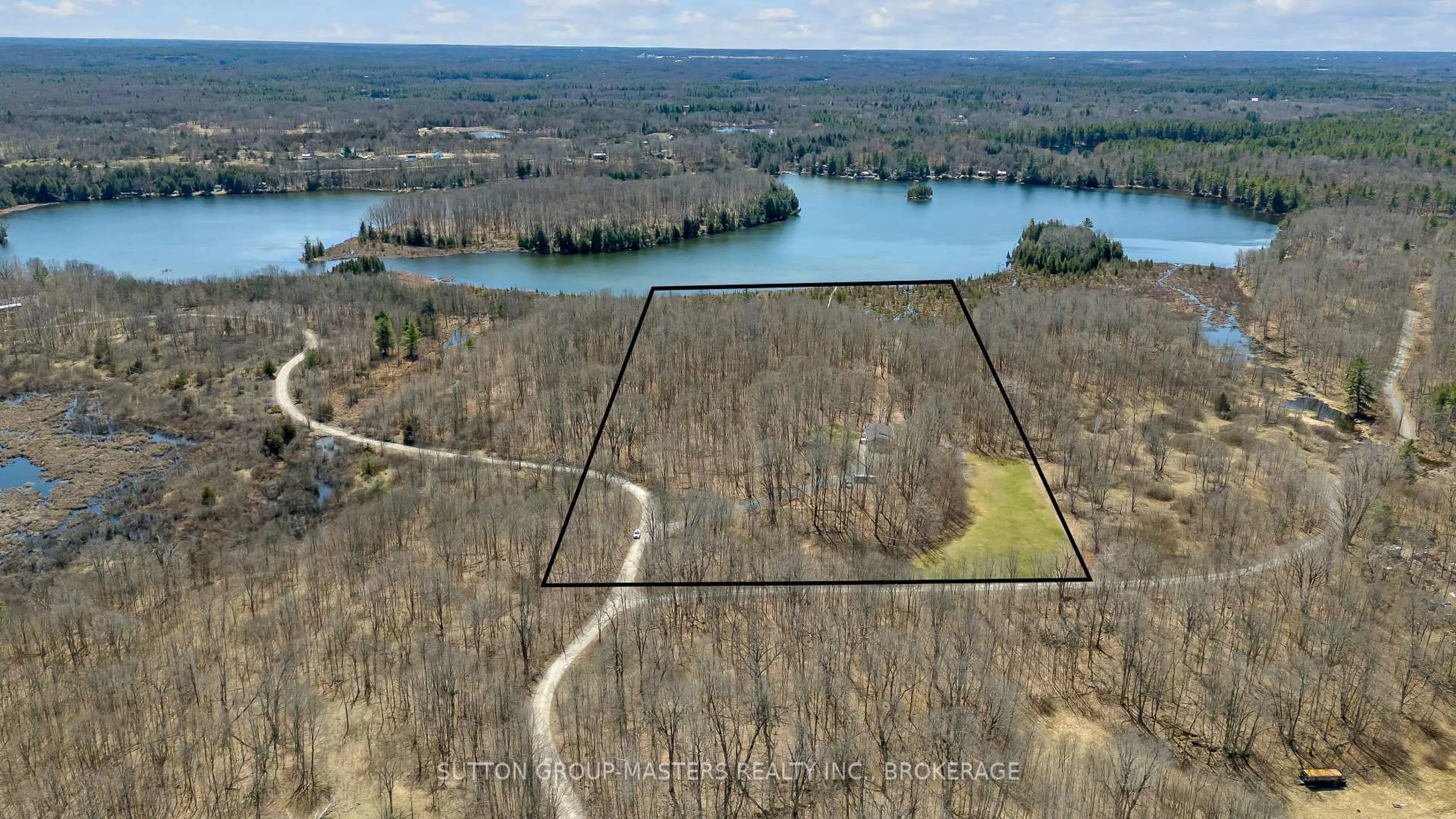 A pic from outside/outdoor area/front of a property/back of a property/a pic from drone, water/lake/river/ocean view for 324 13 Island Lake Lane, Godfrey Ontario K0H 1T0