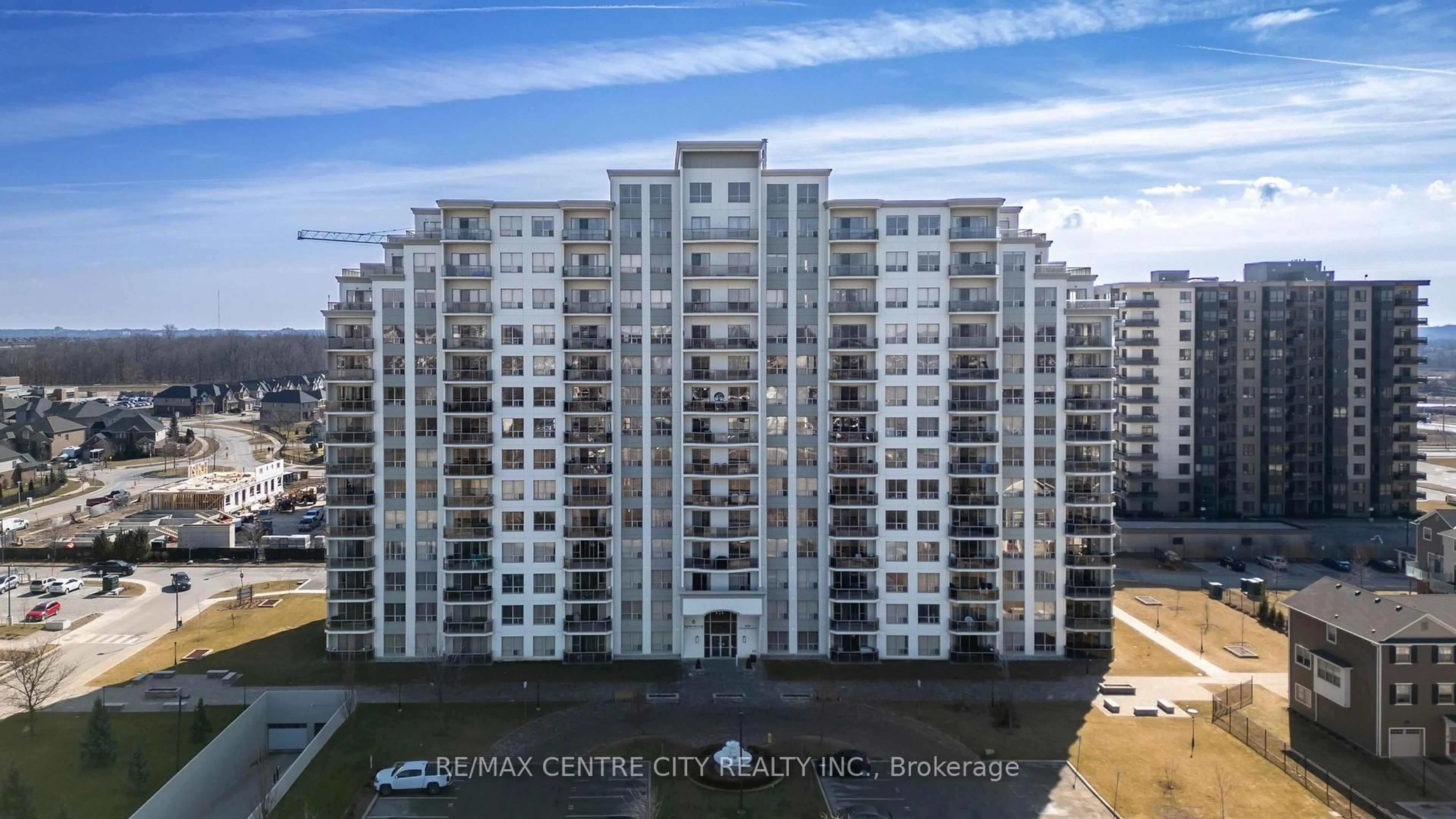 A pic from outside/outdoor area/front of a property/back of a property/a pic from drone, building for 1030 CORONATION Dr #306, London North Ontario N6G 0G5