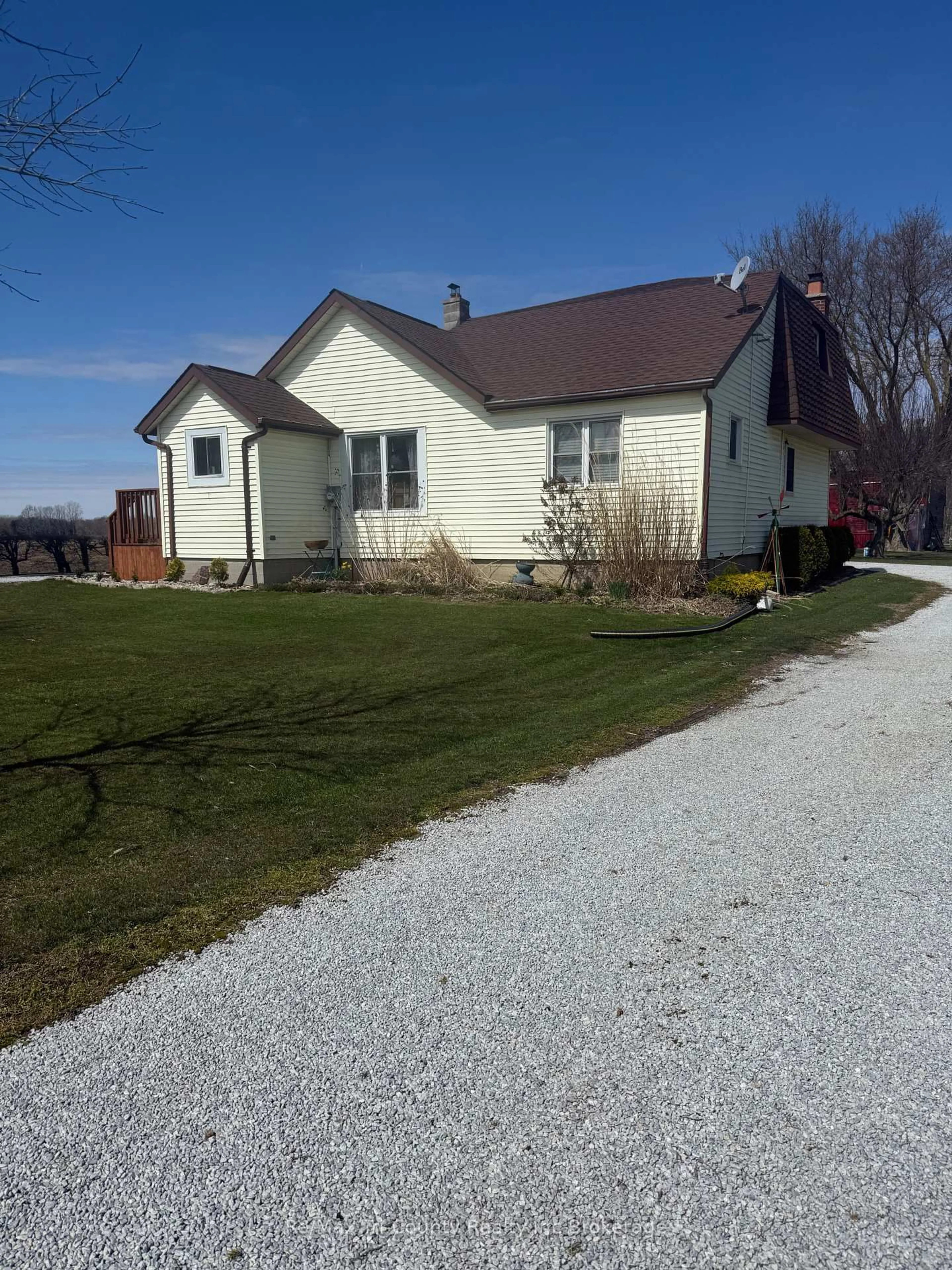 A pic from outside/outdoor area/front of a property/back of a property/a pic from drone, street for 23482 Queens Line, West Elgin Ontario N0L 2C0