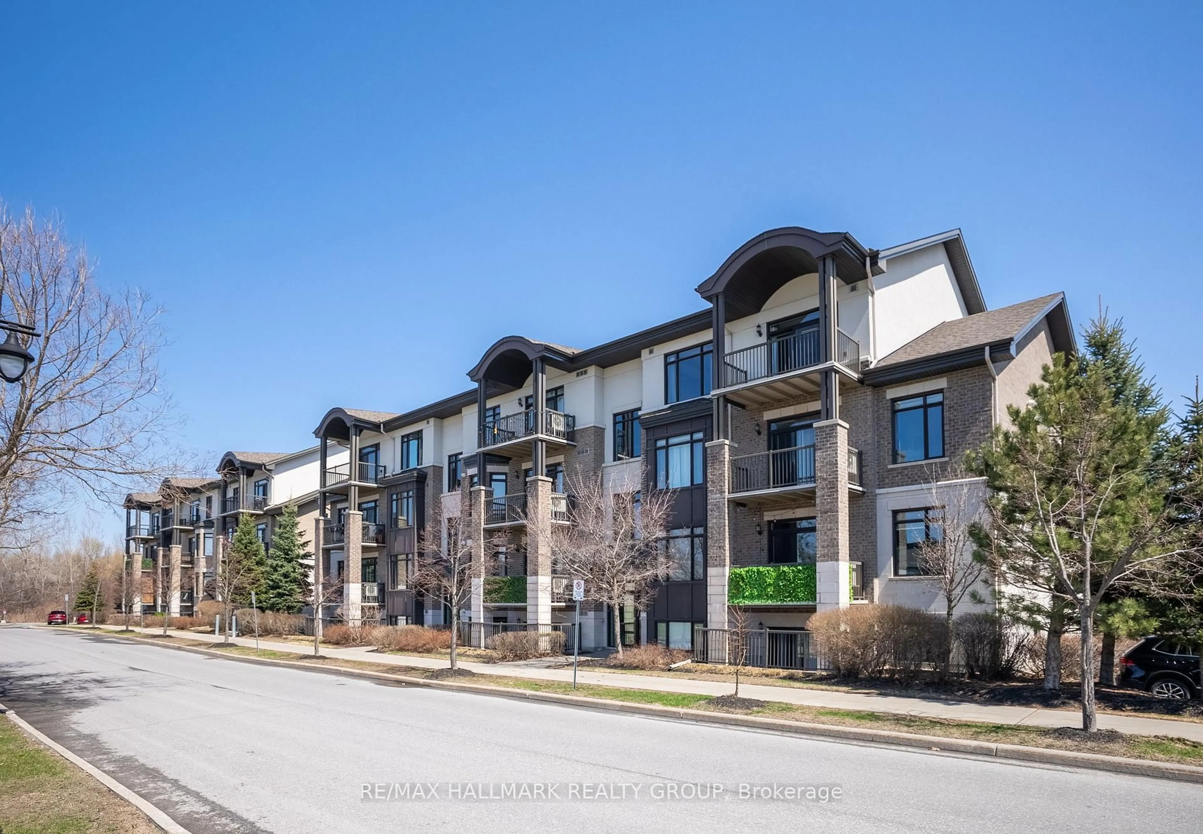 A pic from outside/outdoor area/front of a property/back of a property/a pic from drone, street for 705 Beauparc Private #403, Ottawa Ontario K1J 0B6