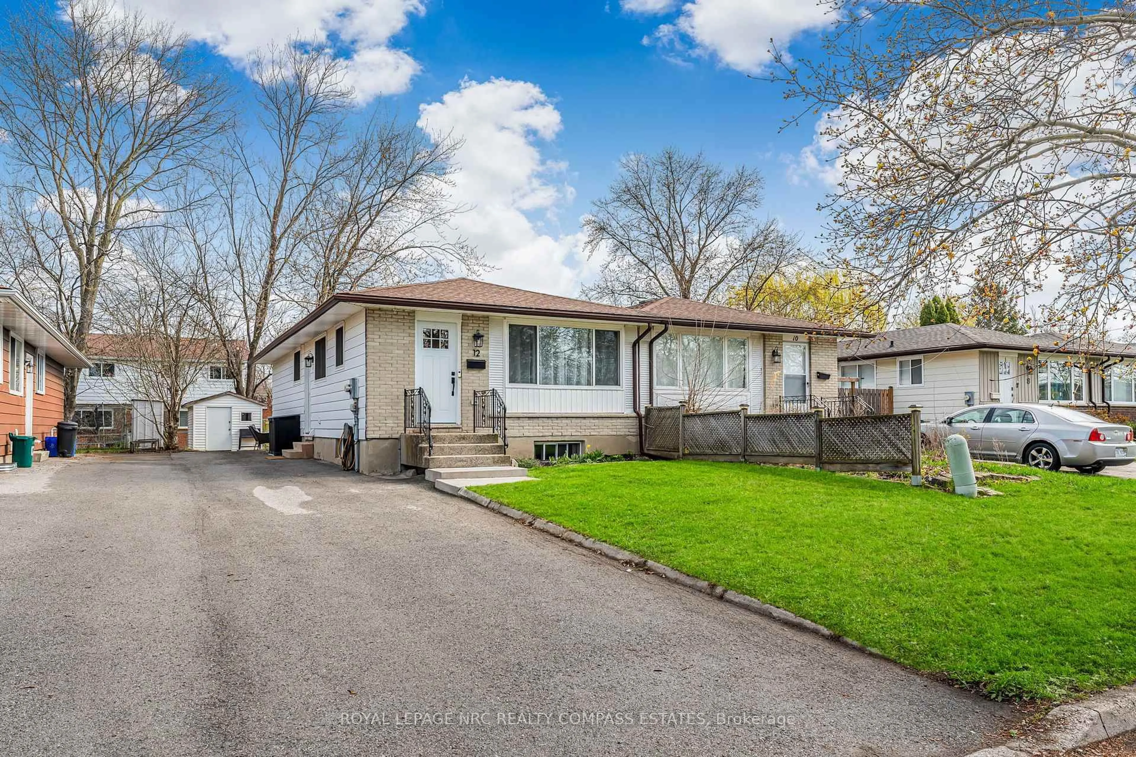 Home with vinyl exterior material, street for 12 WALLACE St, St. Catharines Ontario L2S 1E9