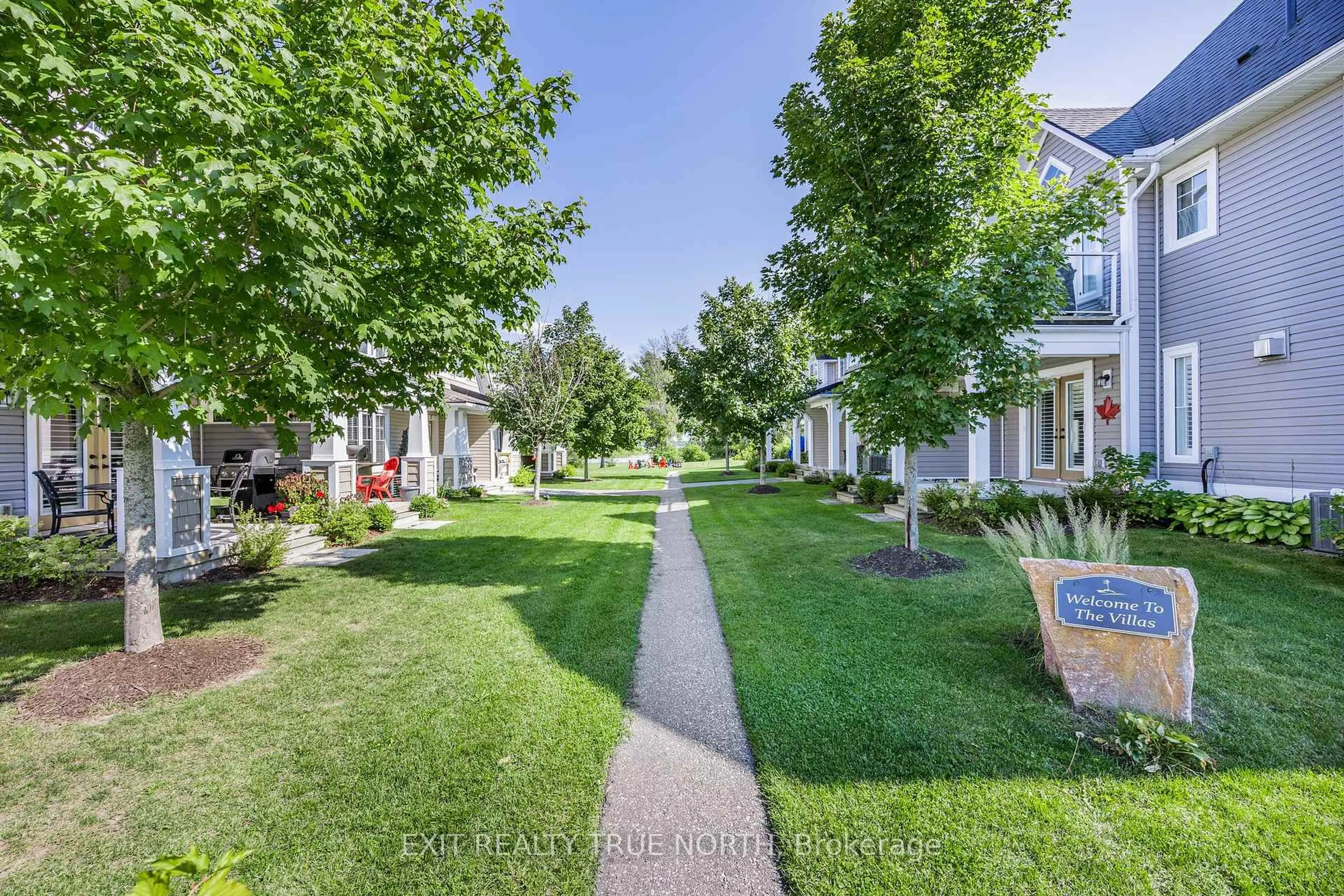 A pic from outside/outdoor area/front of a property/back of a property/a pic from drone, street for 9 Mulligan Lane #21, Georgian Bay Ontario L0K 1S0