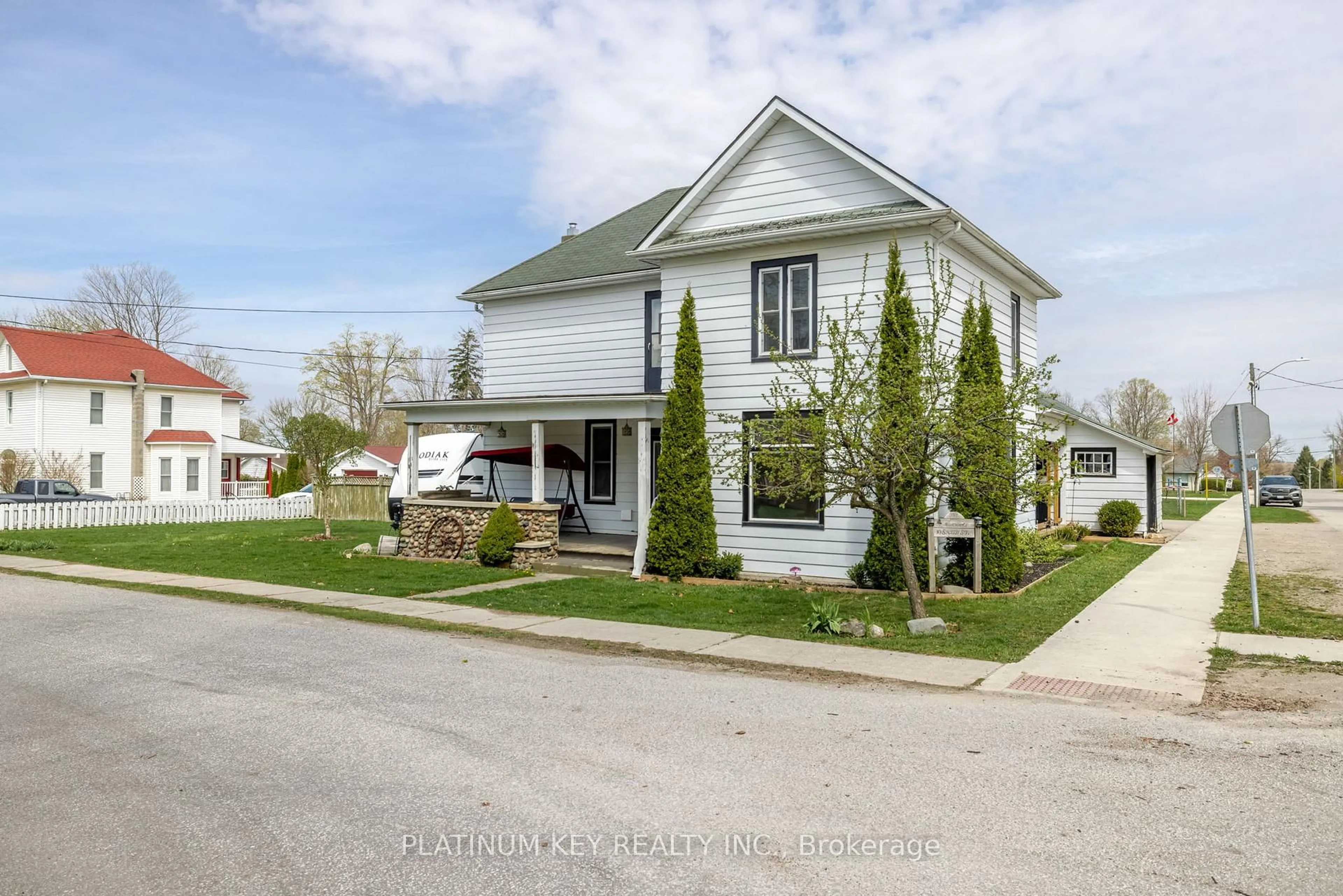 Home with vinyl exterior material, street for 10 Smith St, Lambton Shores Ontario N0M 1B0