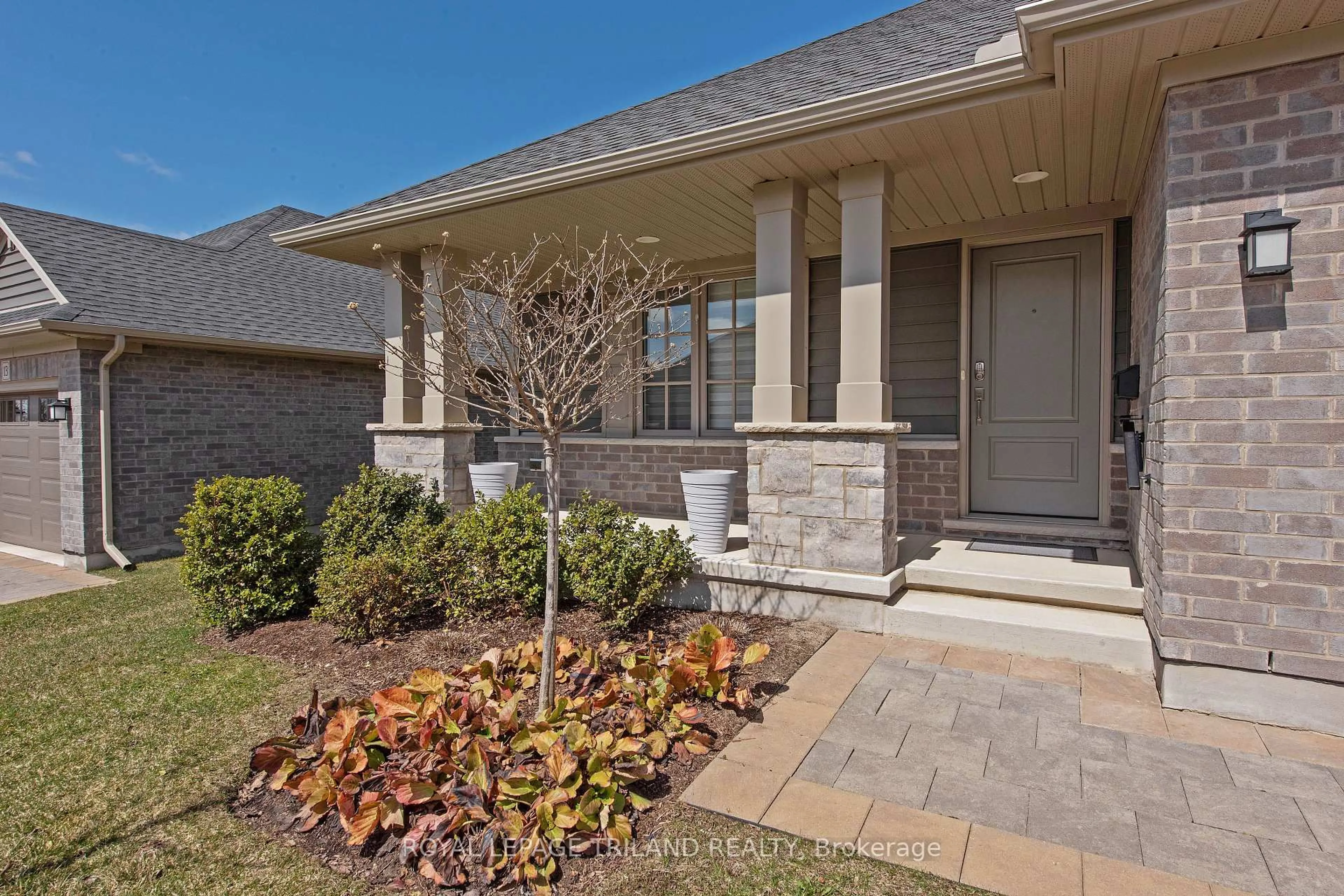 Home with brick exterior material, street for 234 Peach Tree Blvd #11, St. Thomas Ontario N5R 0G8