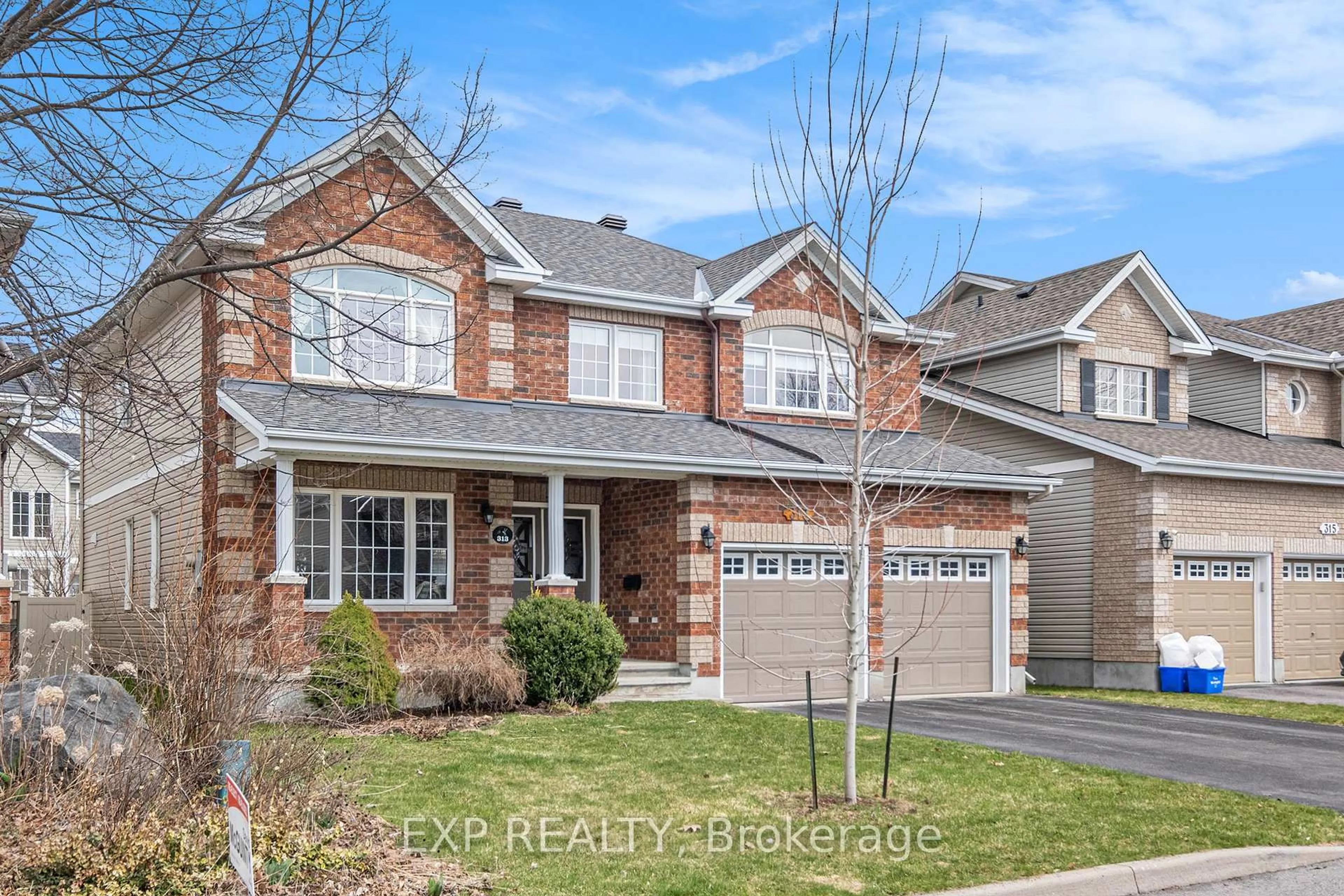 Home with brick exterior material, street for 313 Wild Iris Ave, Ottawa Ontario K1T 0B6