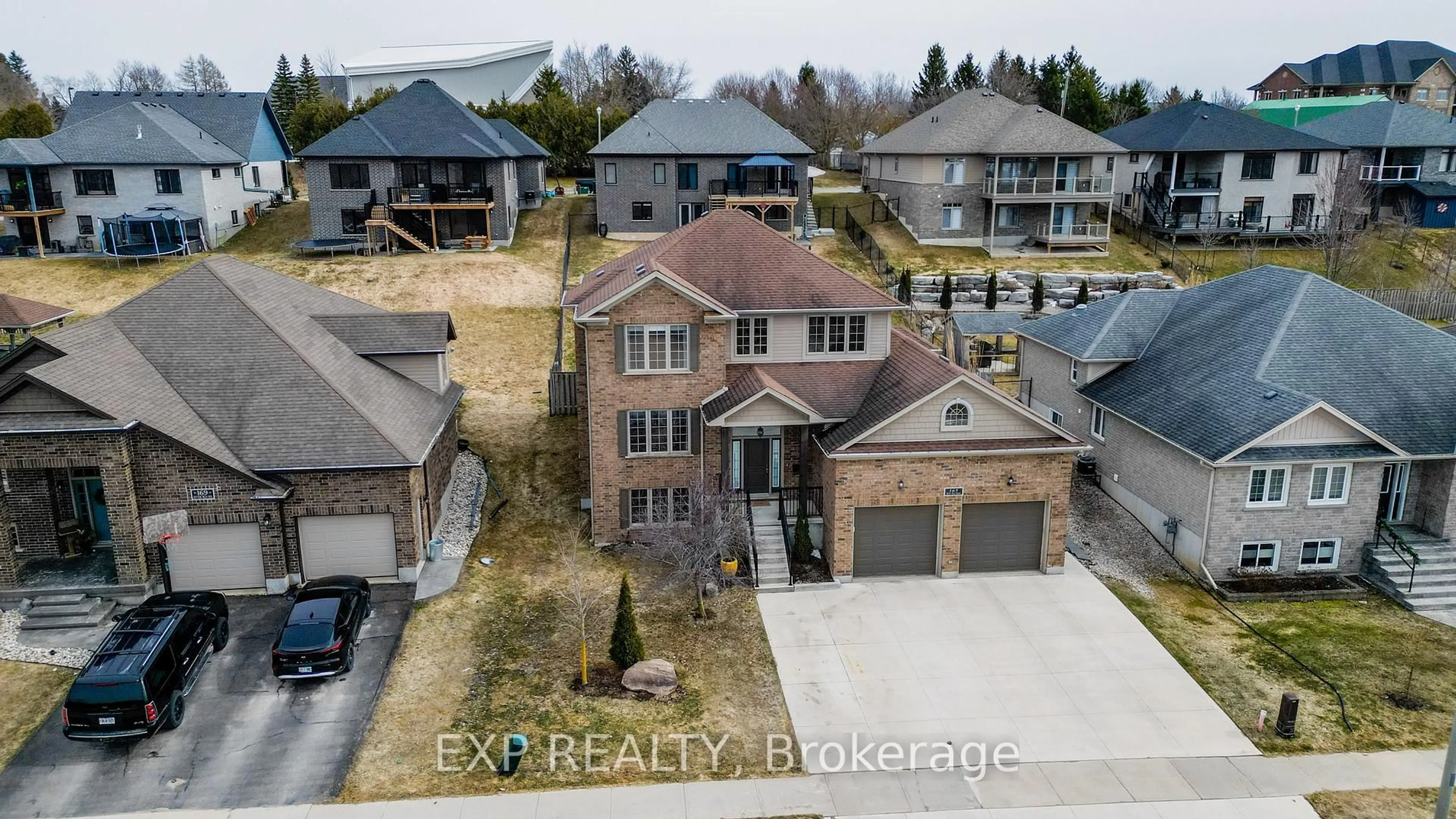A pic from outside/outdoor area/front of a property/back of a property/a pic from drone, street for 165 River Run Rd, Mapleton Ontario N0G 1P0