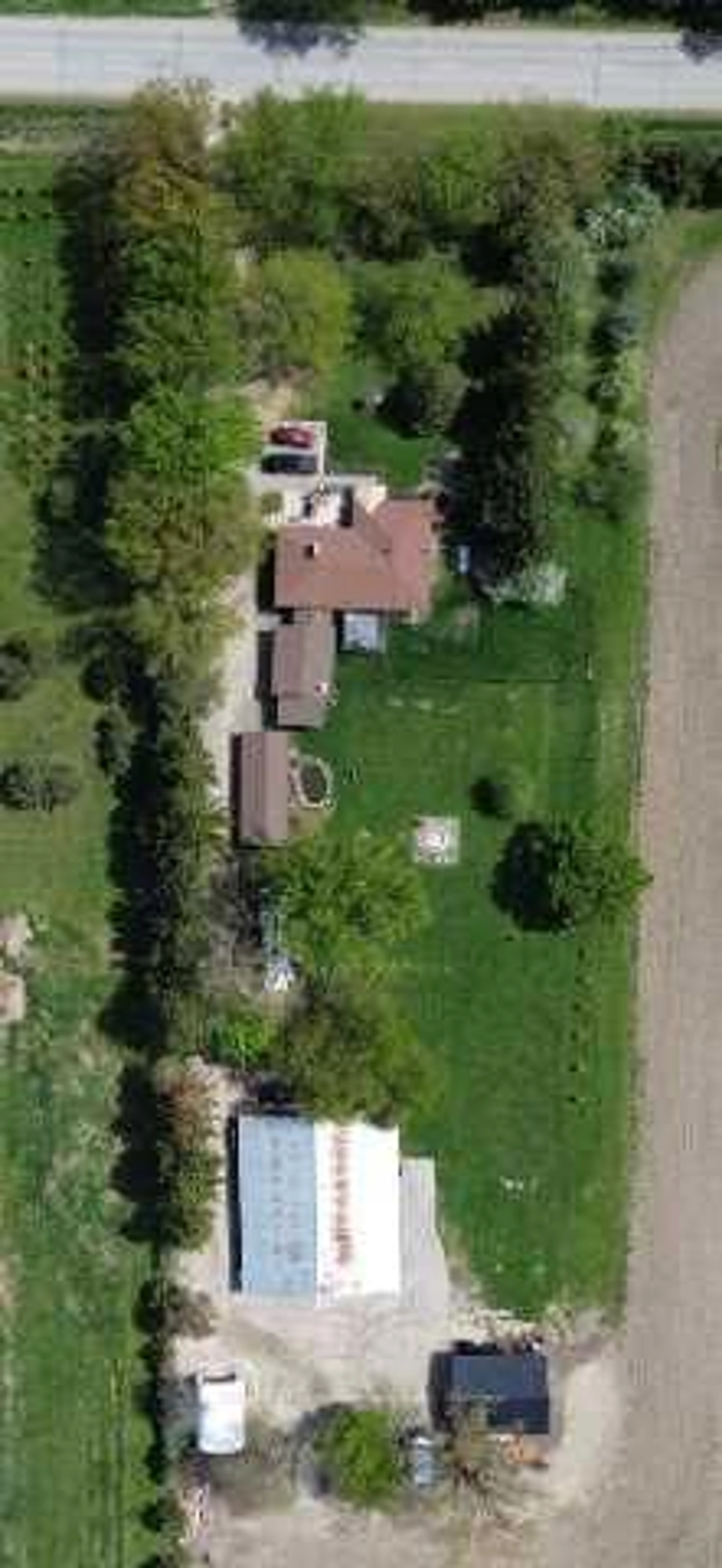 A pic from outside/outdoor area/front of a property/back of a property/a pic from drone, street for 20883 REBECCA Rd, Thames Centre Ontario N0E 1W0