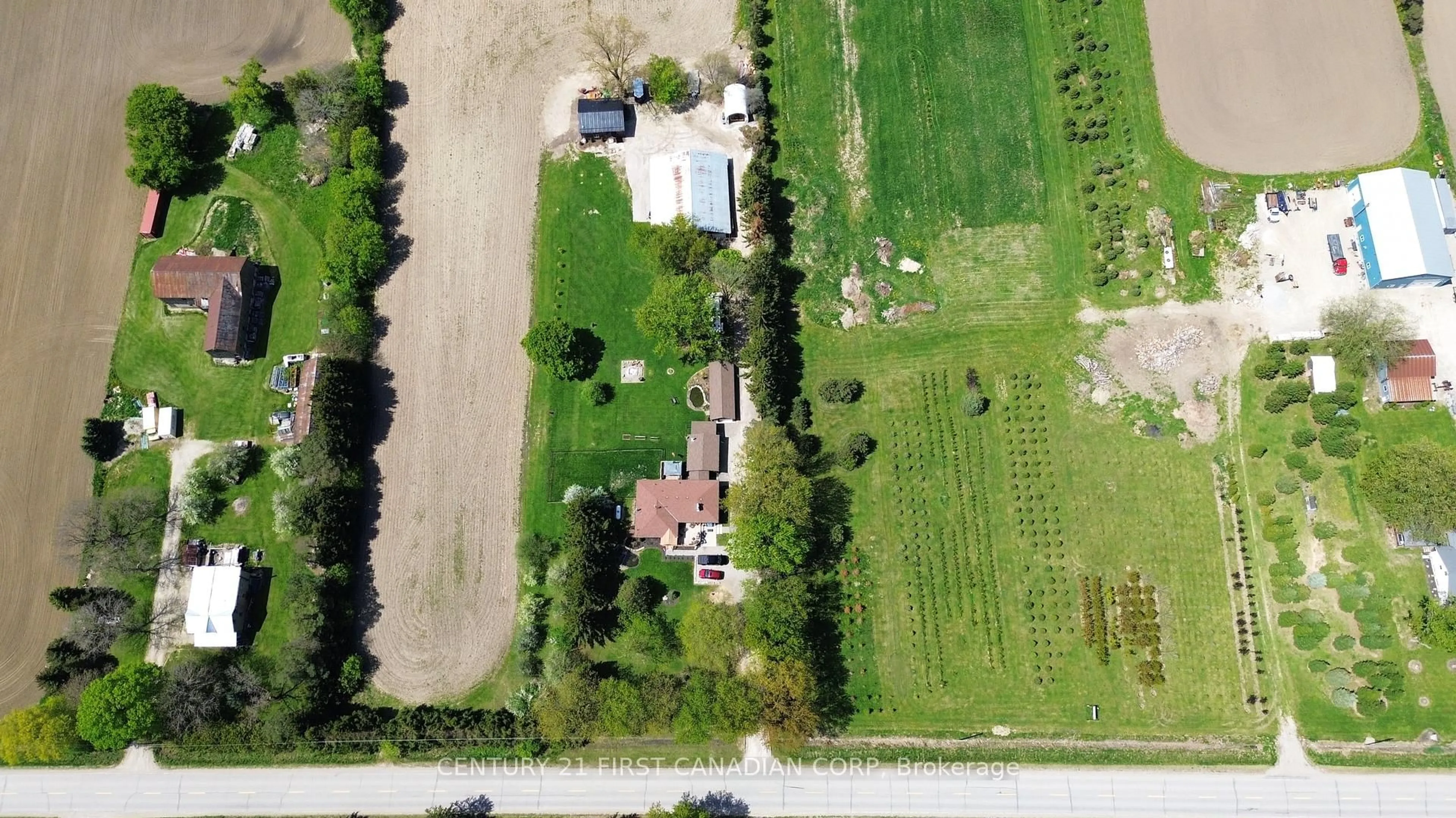 A pic from outside/outdoor area/front of a property/back of a property/a pic from drone, street for 20883 REBECCA Rd, Thames Centre Ontario N0E 1W0